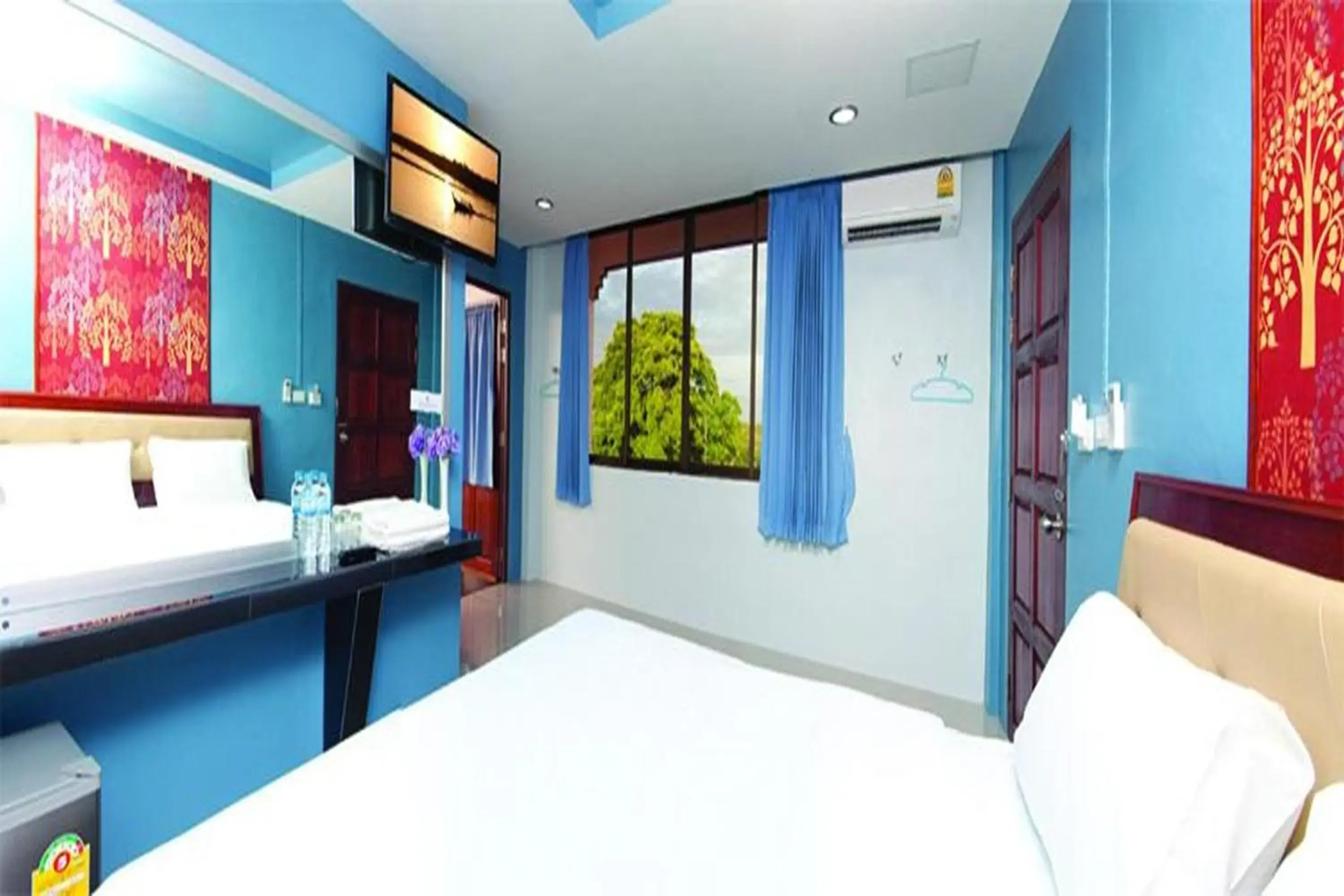 Deluxe Double Room with Balcony in Krabi Orchid Hometel Deluxe Double Room with Balcony in Krabi Orchid Hometel