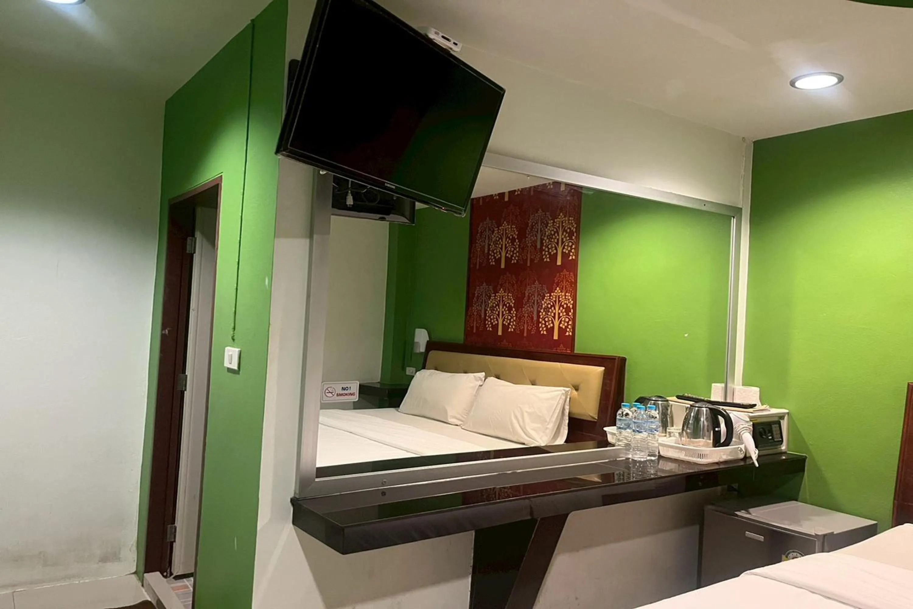 Bed in Krabi Orchid Hometel