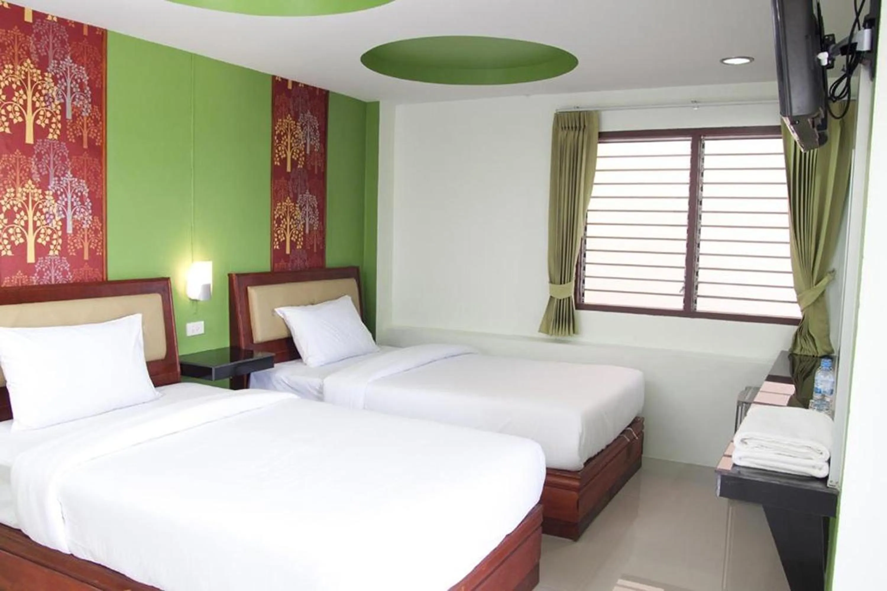 Bed in Krabi Orchid Hometel