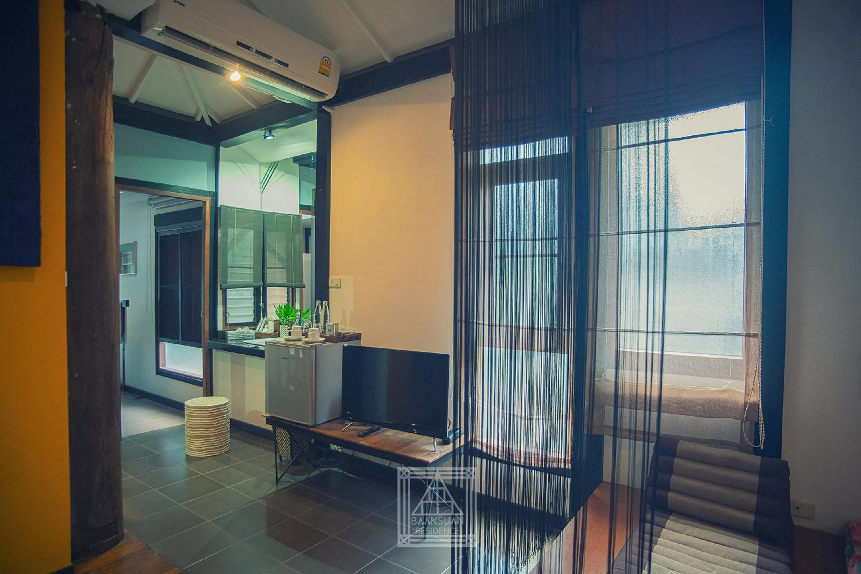 Living room in Baan Suan Residence เฮือนพักบ้านสวน