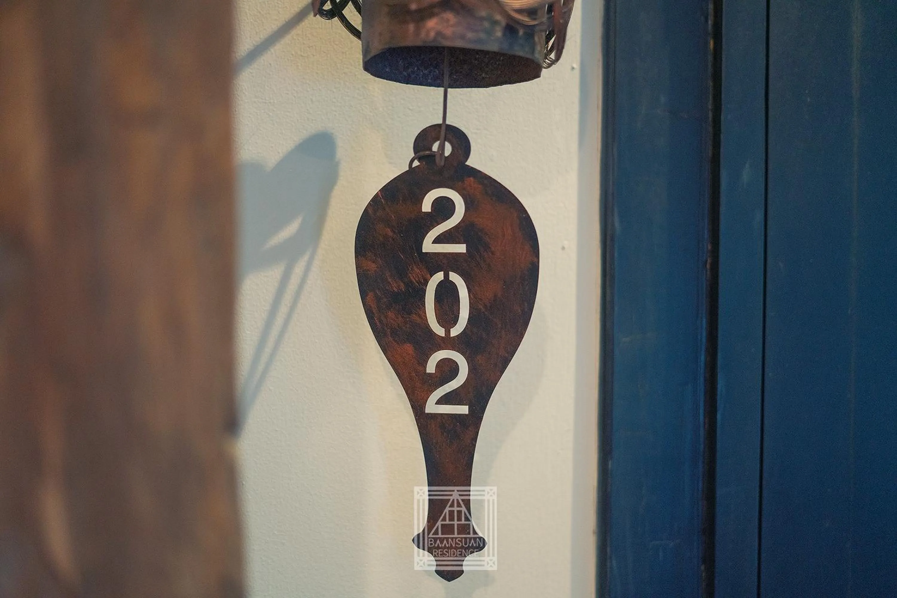 Text overlay in Baan Suan Residence เฮือนพักบ้านสวน