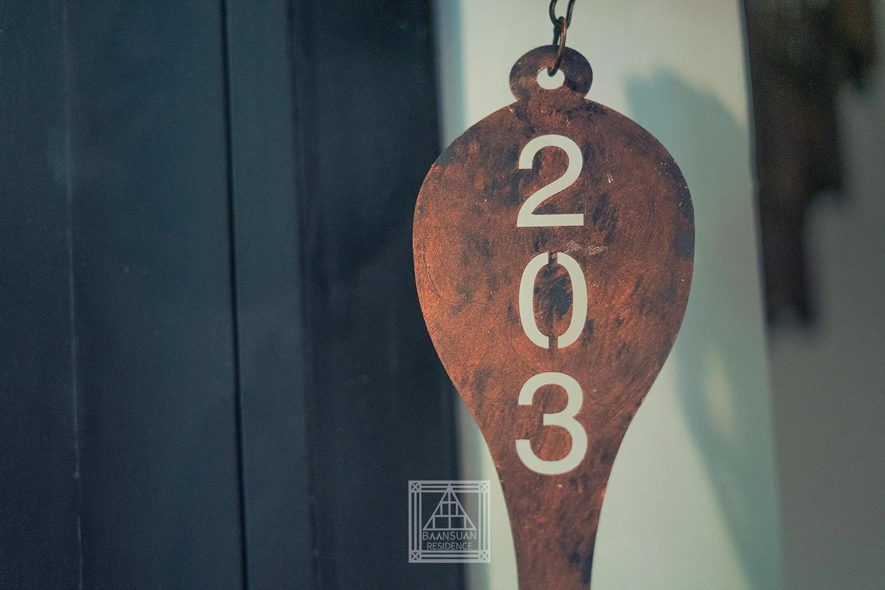 Text overlay in Baan Suan Residence เฮือนพักบ้านสวน