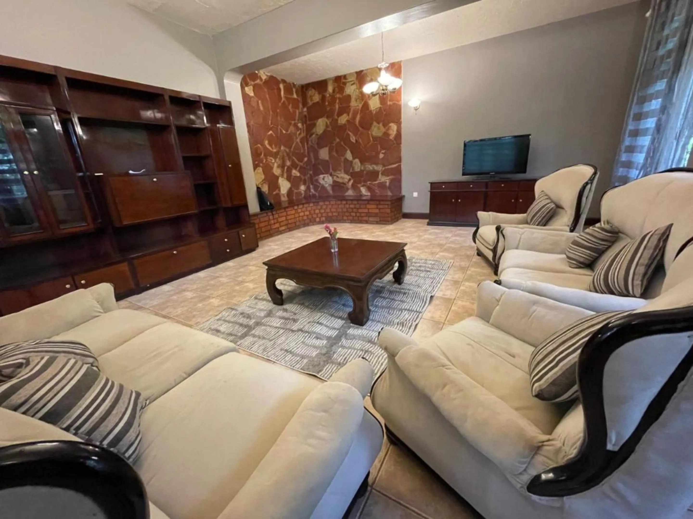 Communal lounge/ TV room in Olivia Guesthouse