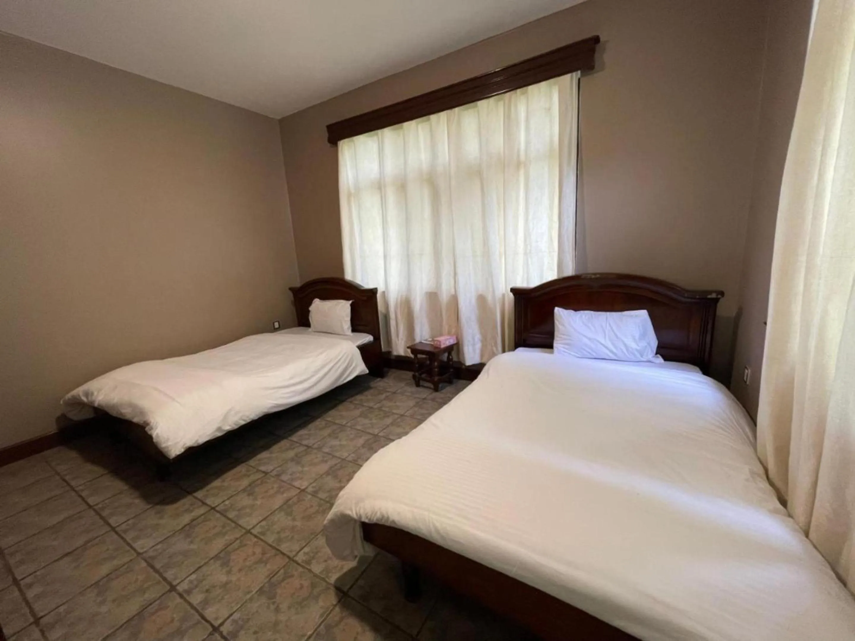 Bed in Olivia Guesthouse