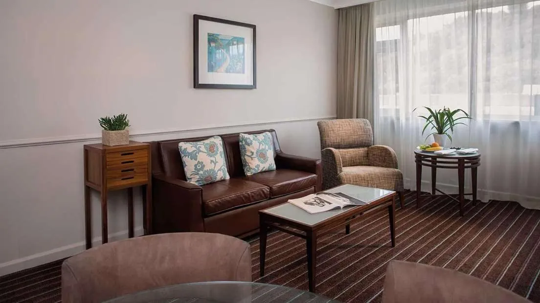 Living room in L’Horizon Beach Hotel & Spa