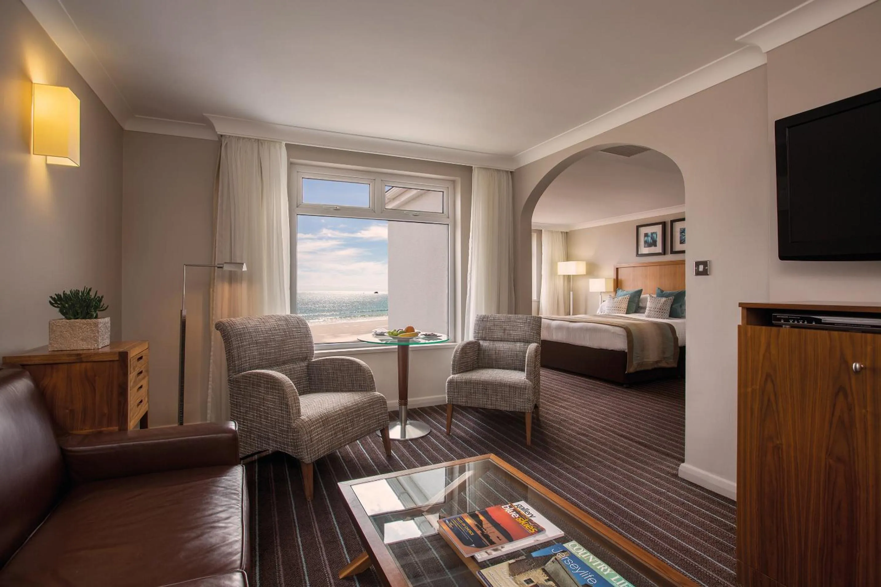 Living room, Bed in L’Horizon Beach Hotel & Spa