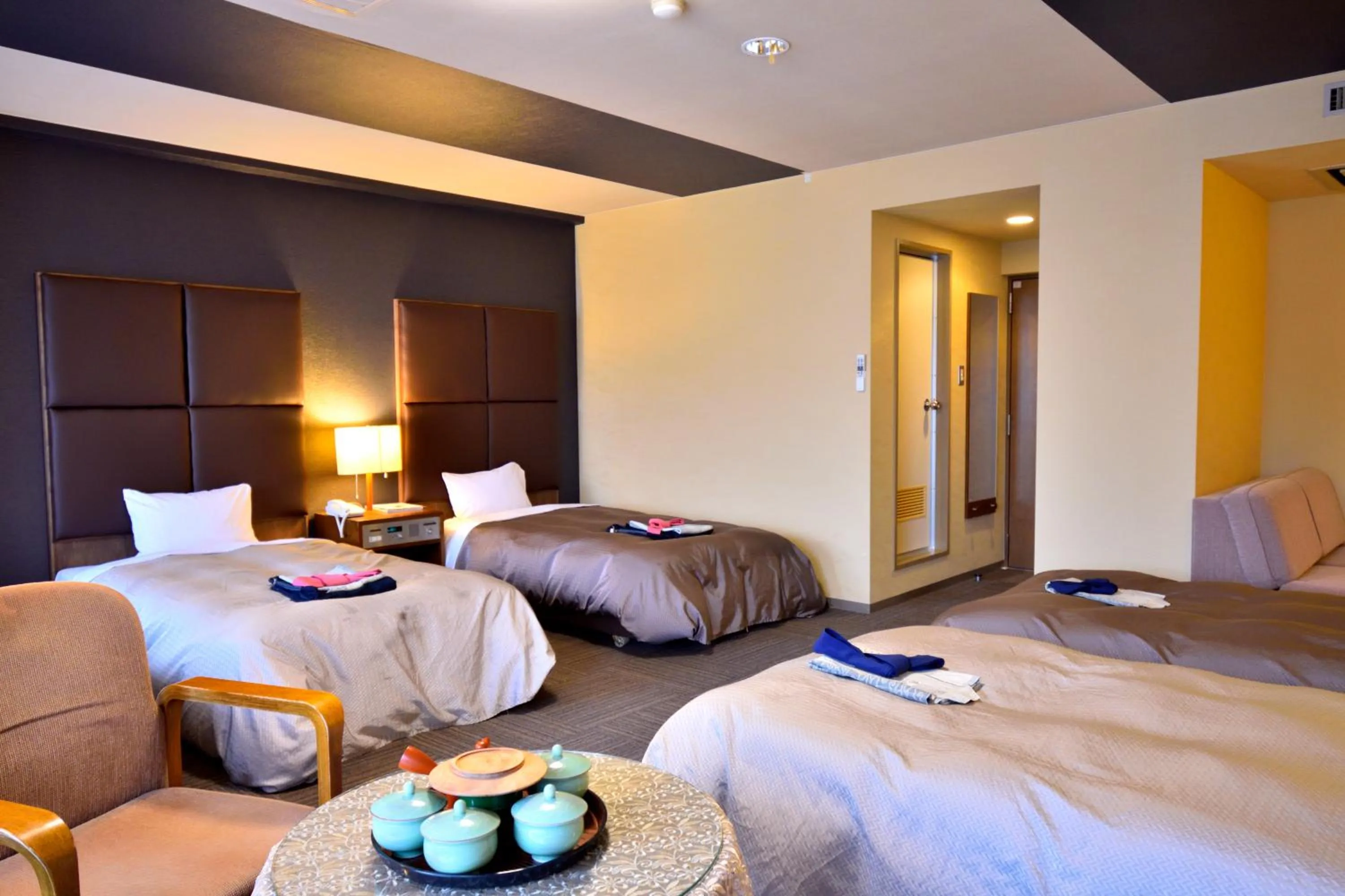 Bed in こんぴら温泉 貸切湯の宿 ことね