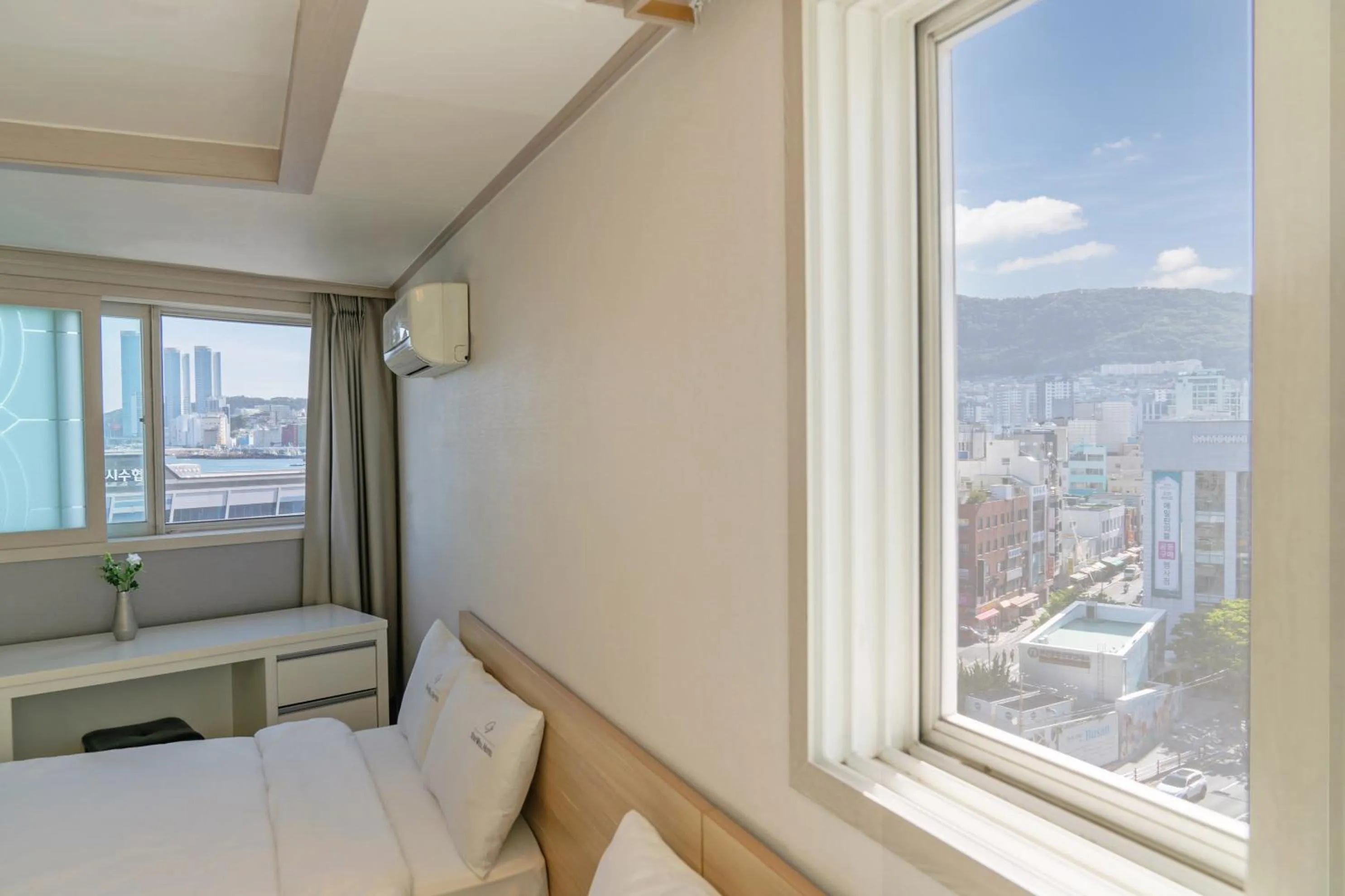 Bed in Staywell Hotel