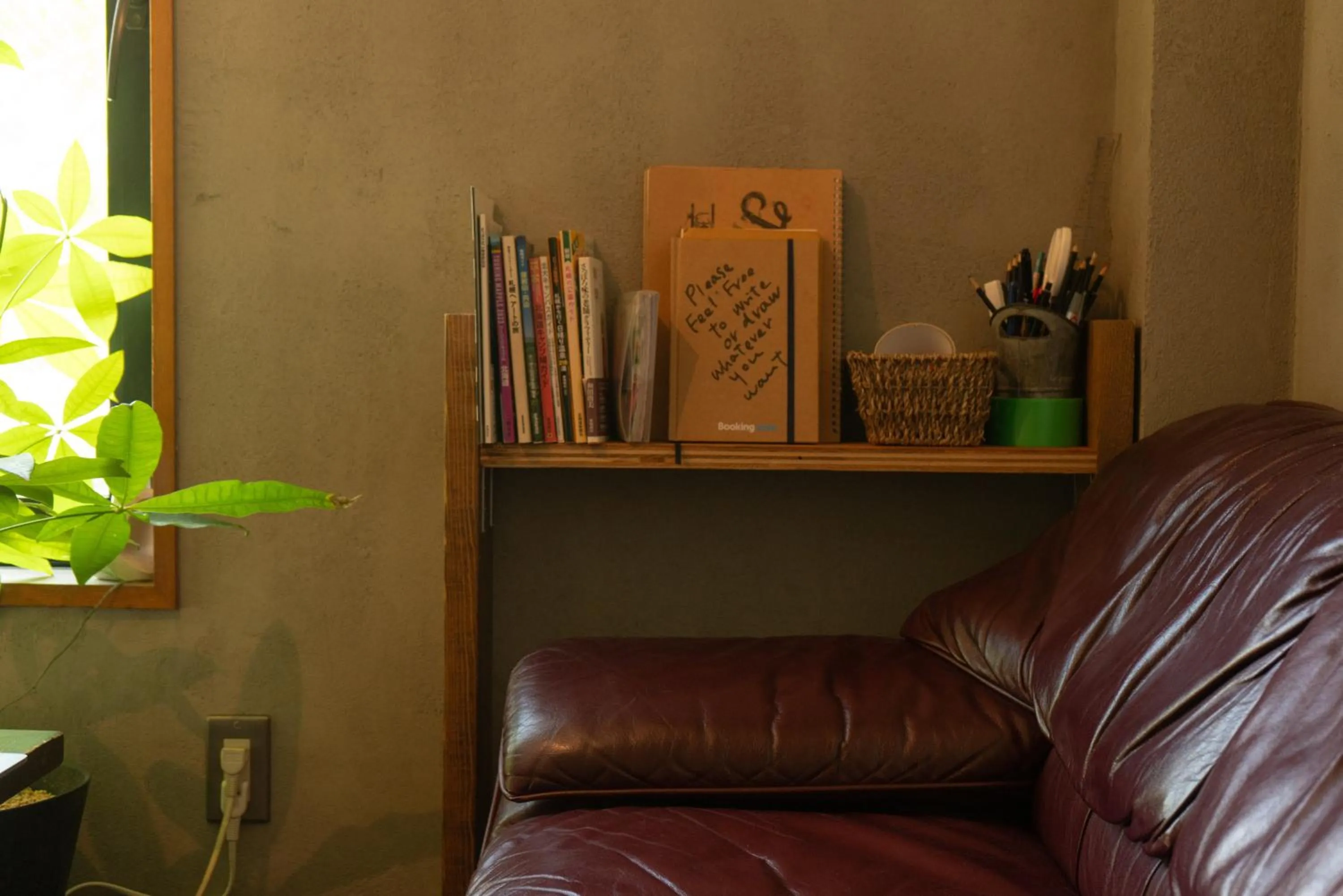 Communal lounge/ TV room in Untapped Hostel