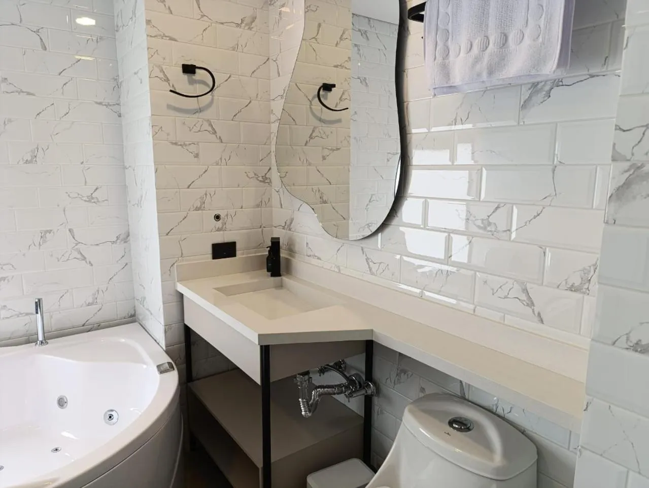 Bathroom in Hotel Living 35 Suites by Growing Group