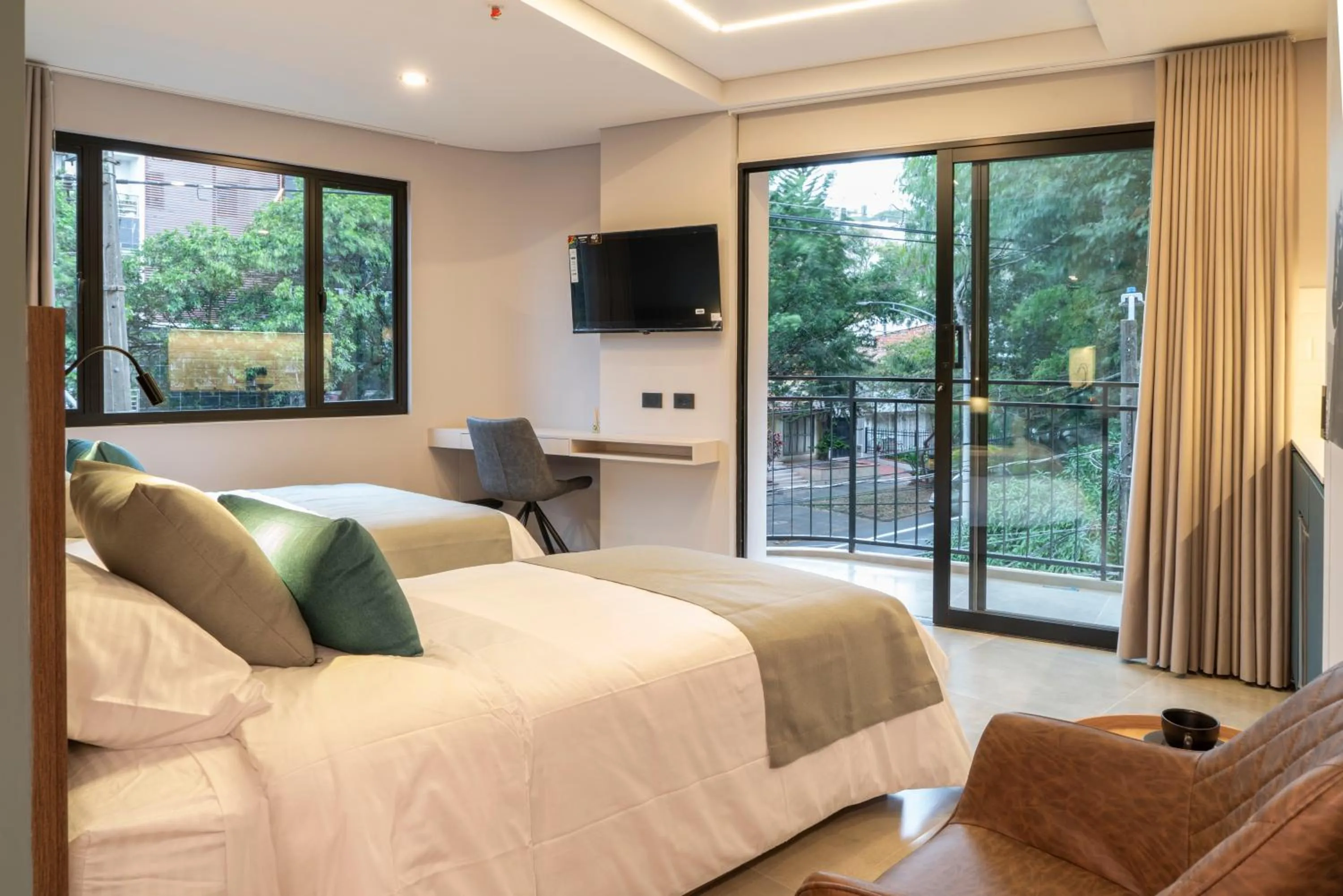 TV and multimedia, Bed in Hotel Living 35 Suites by Growing Group