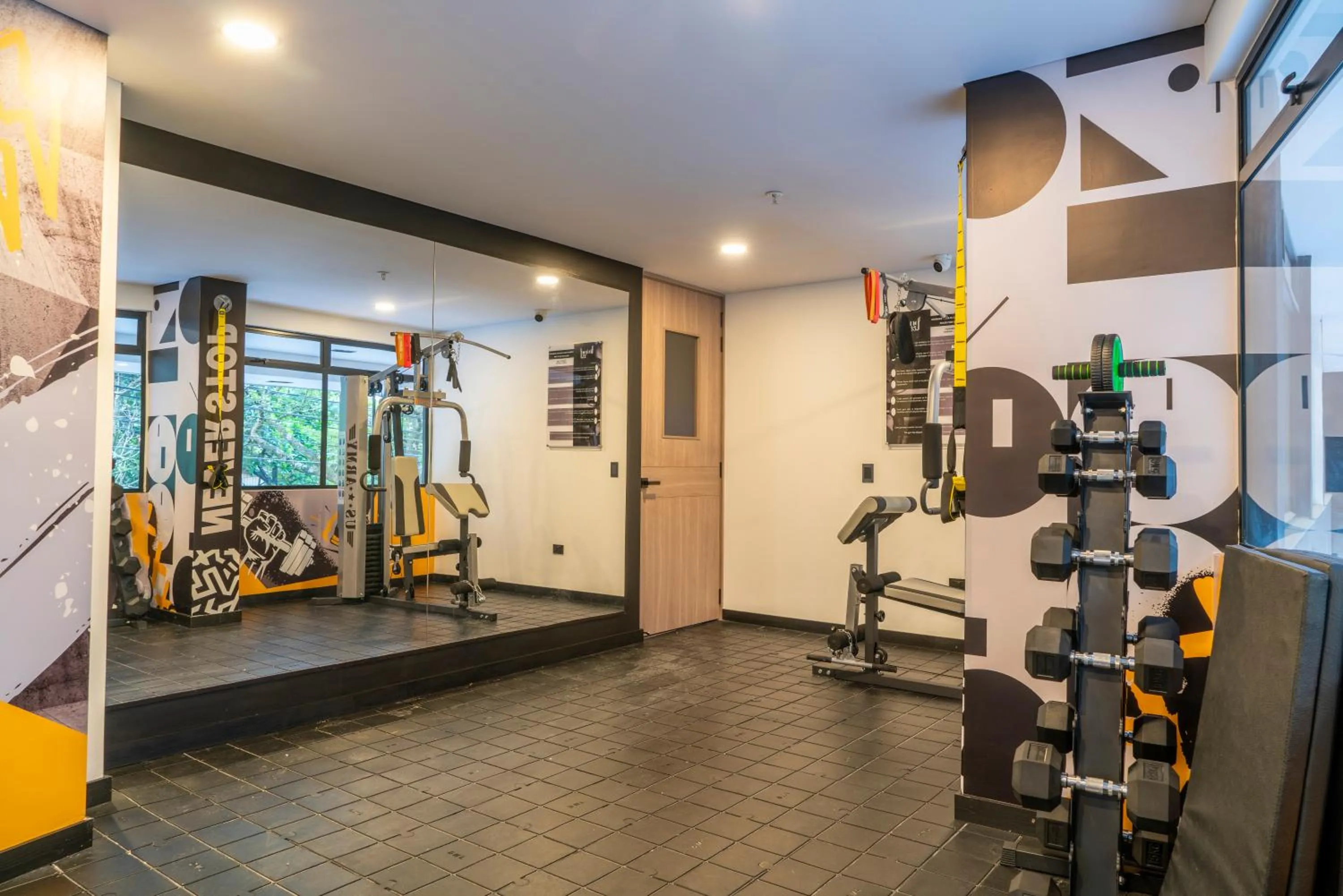 Fitness centre/facilities in Hotel Living 35 Suites by Growing Group
