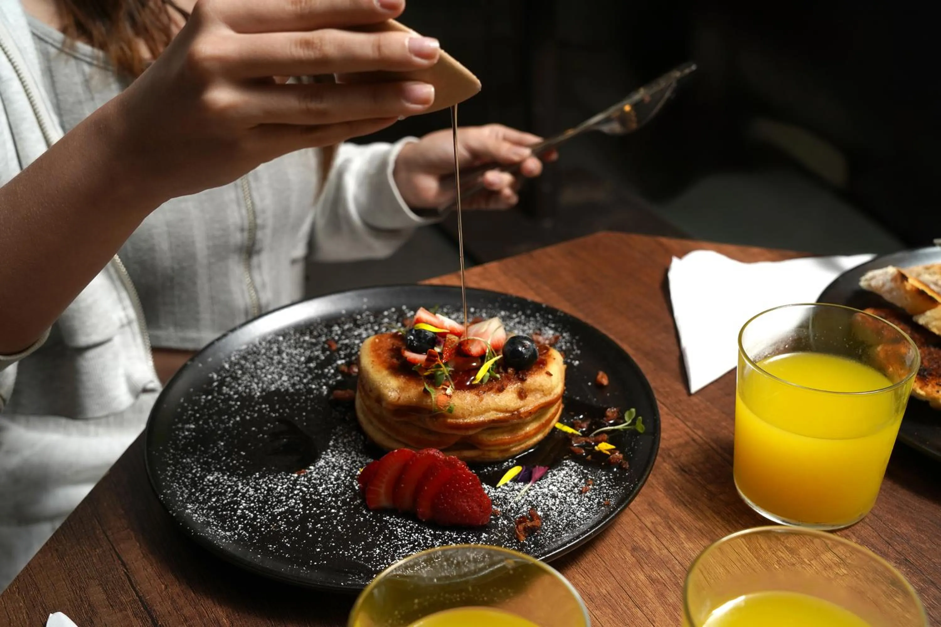 Restaurant/places to eat in Hotel Living 35 Suites by Growing Group