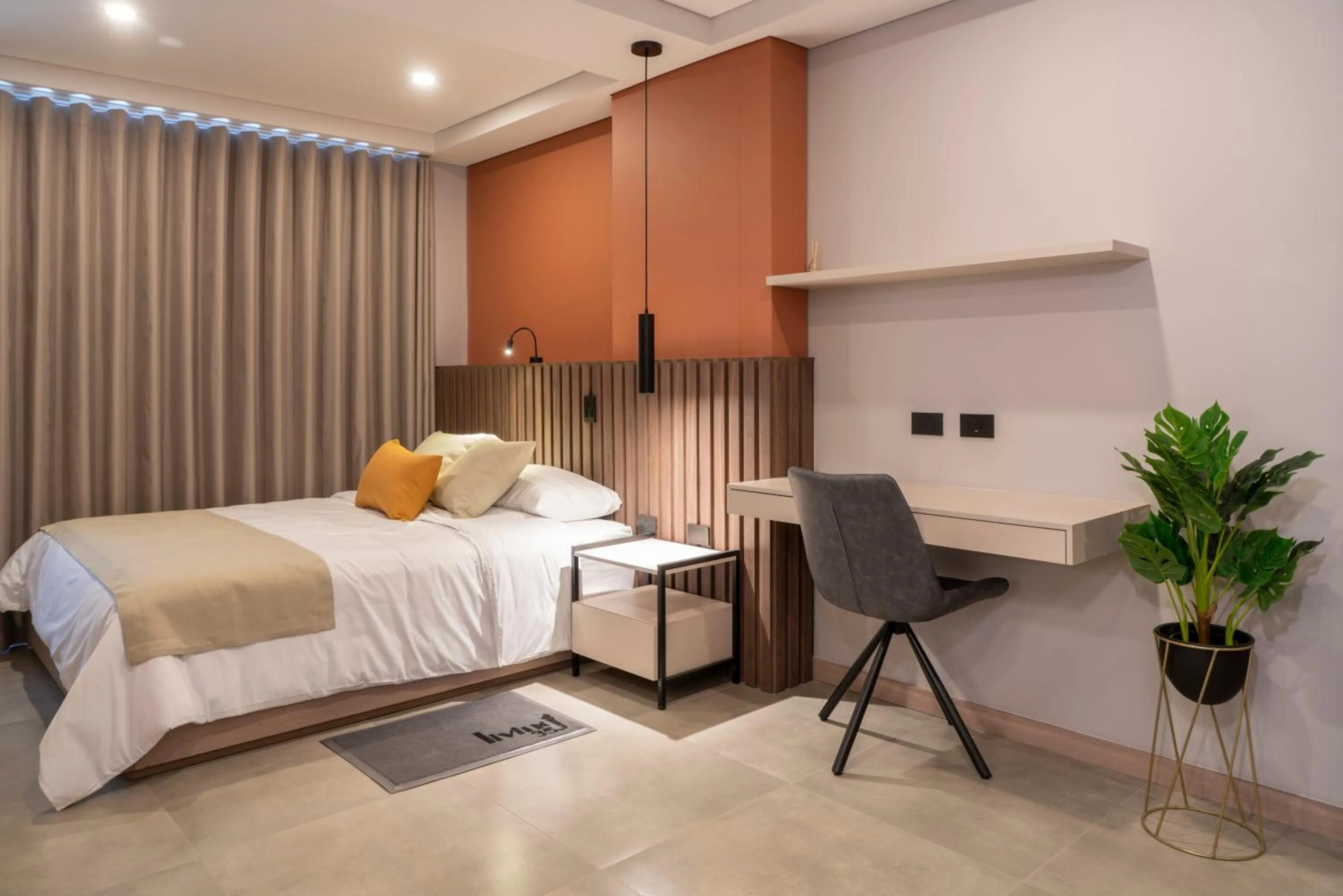Bed in Hotel Living 35 Suites by Growing Group