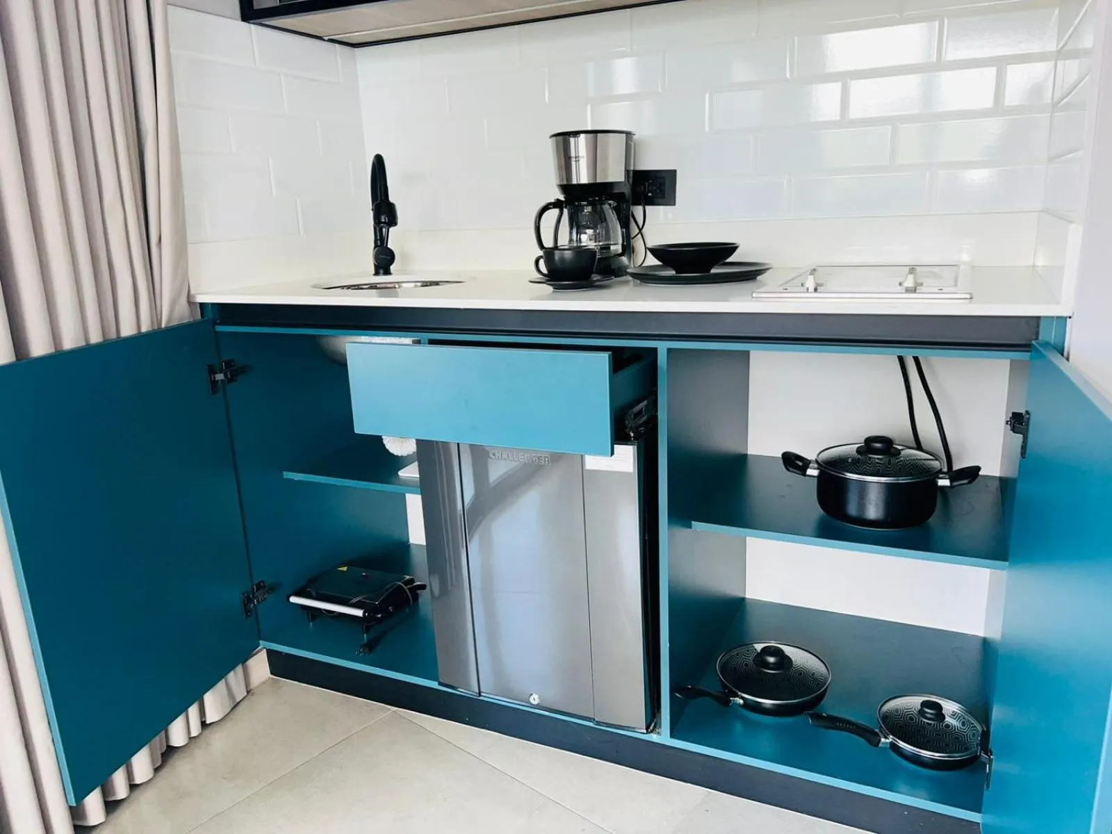 kitchen in Hotel Living 35 Suites by Growing Group