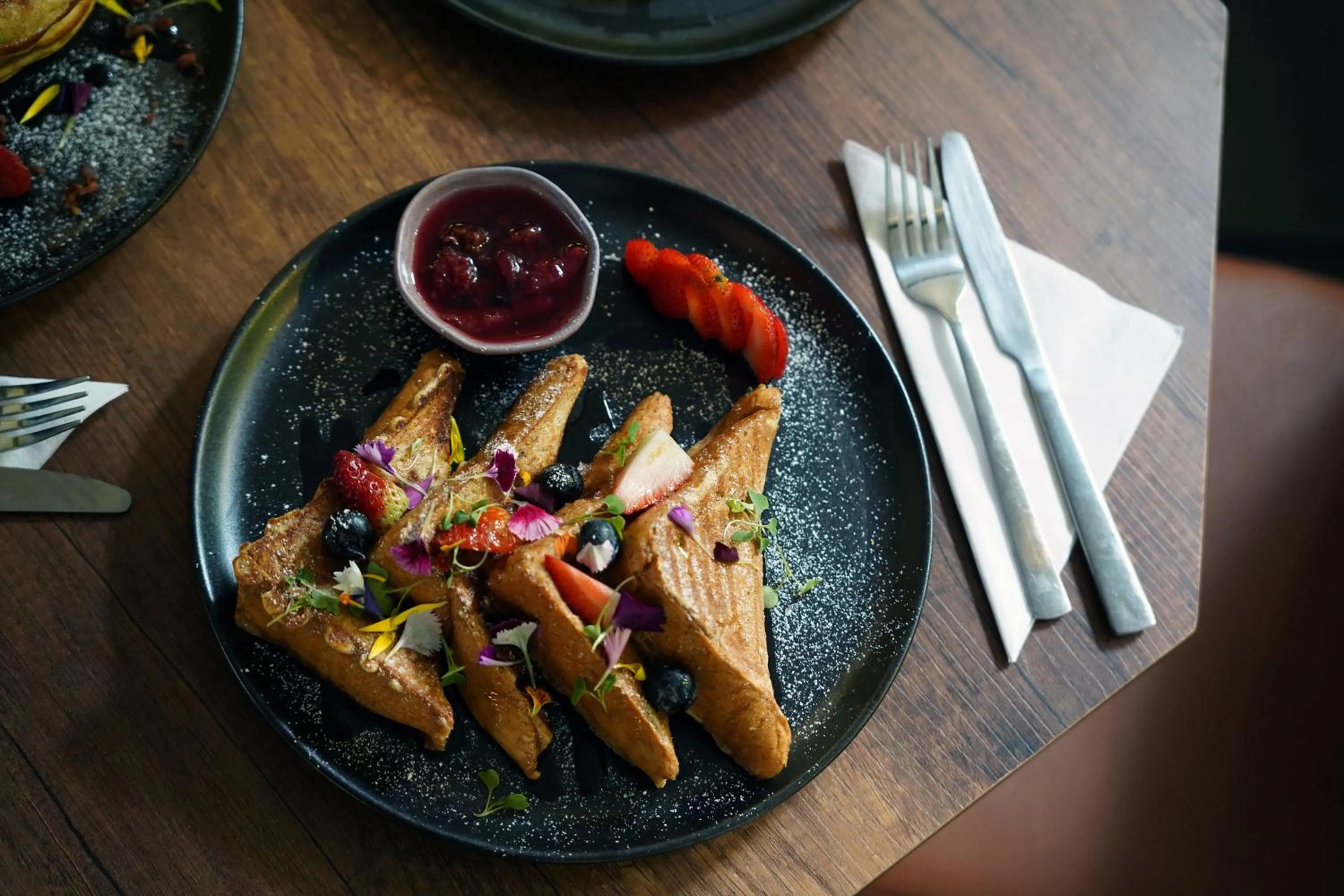 Restaurant/places to eat in Hotel Living 35 Suites by Growing Group