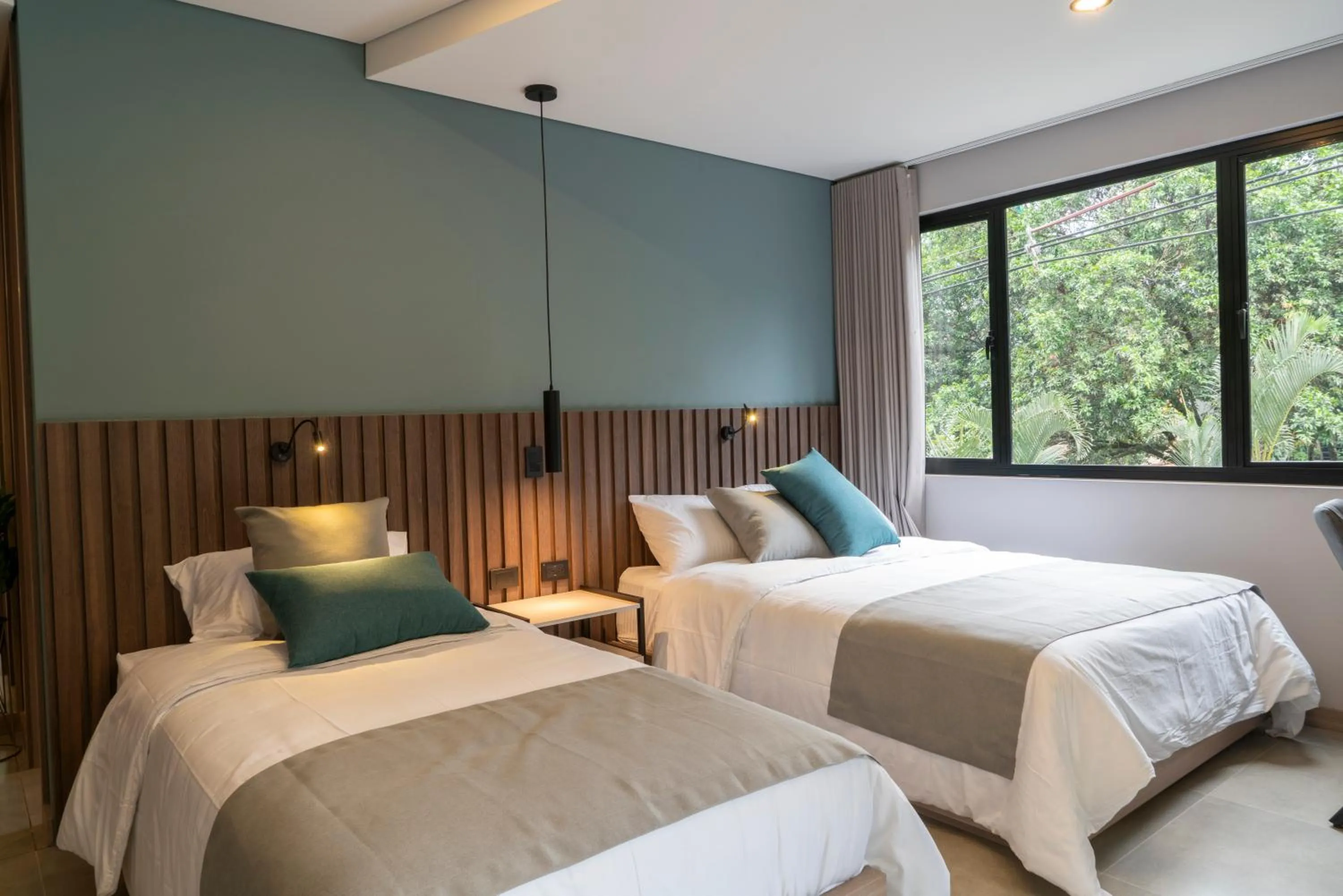 Bed in Hotel Living 35 Suites by Growing Group