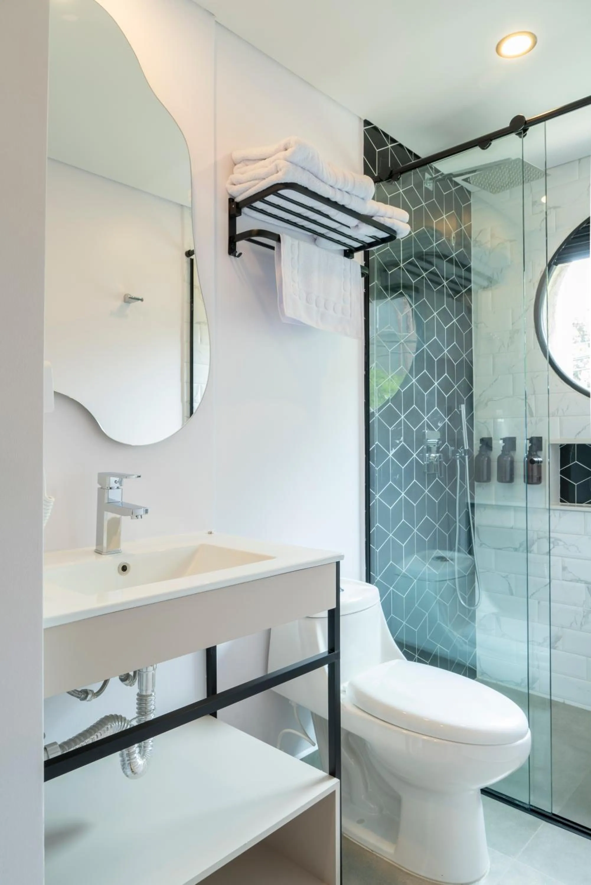 Shower in Hotel Living 35 Suites by Growing Group