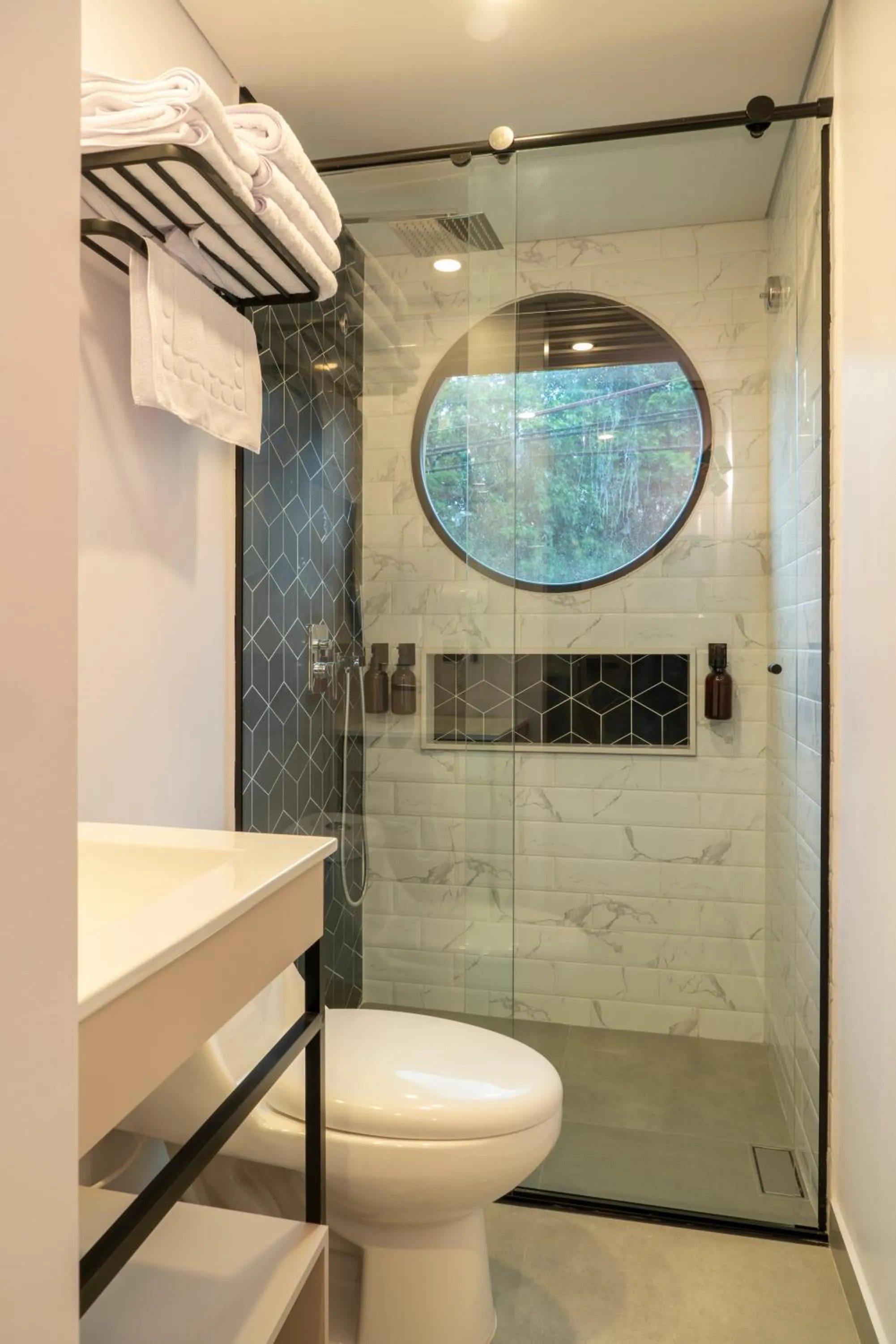 Shower in Hotel Living 35 Suites by Growing Group