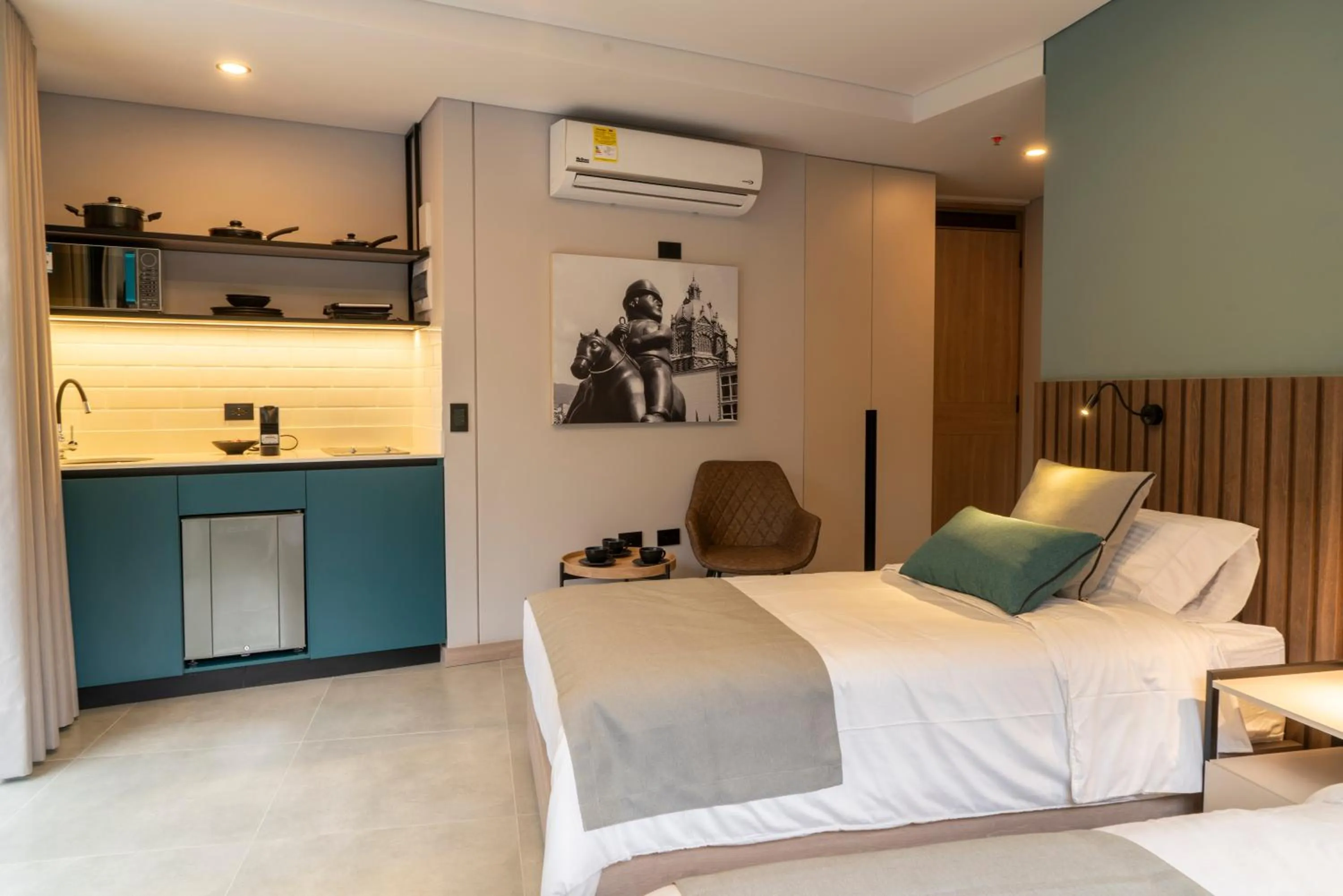 Bed in Hotel Living 35 Suites by Growing Group