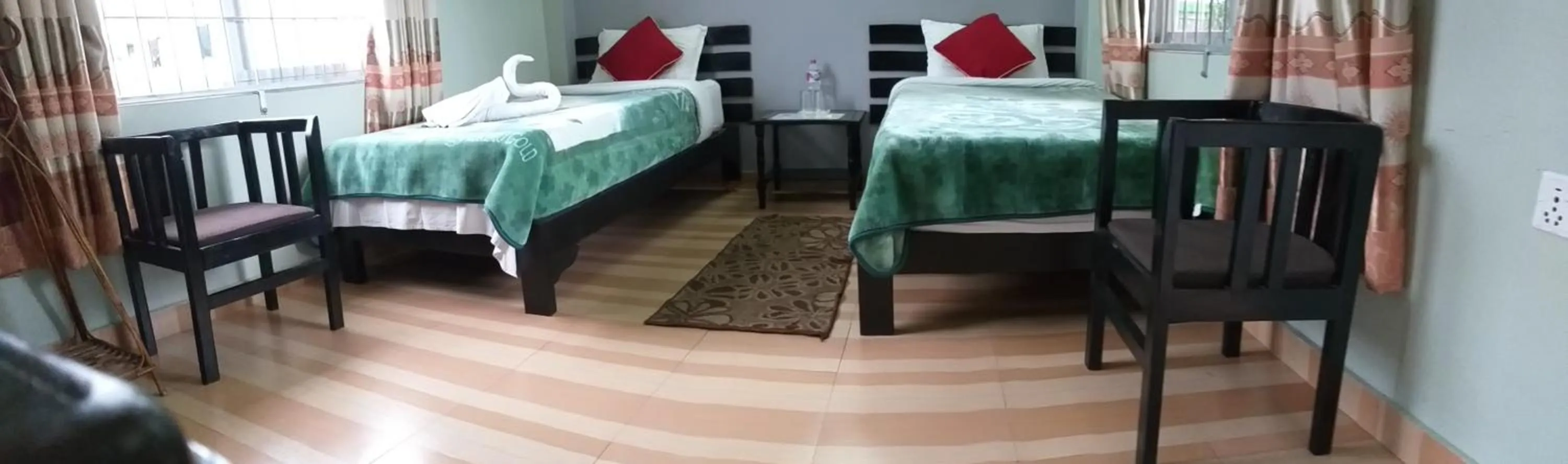 Bed in Harvest Moon Guest House