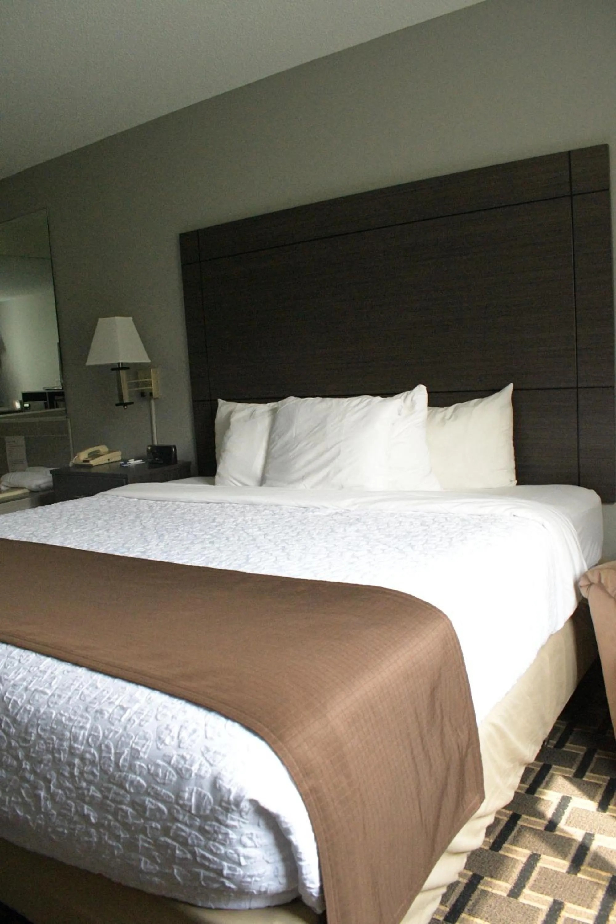 Bed in Adams Inn and Suites