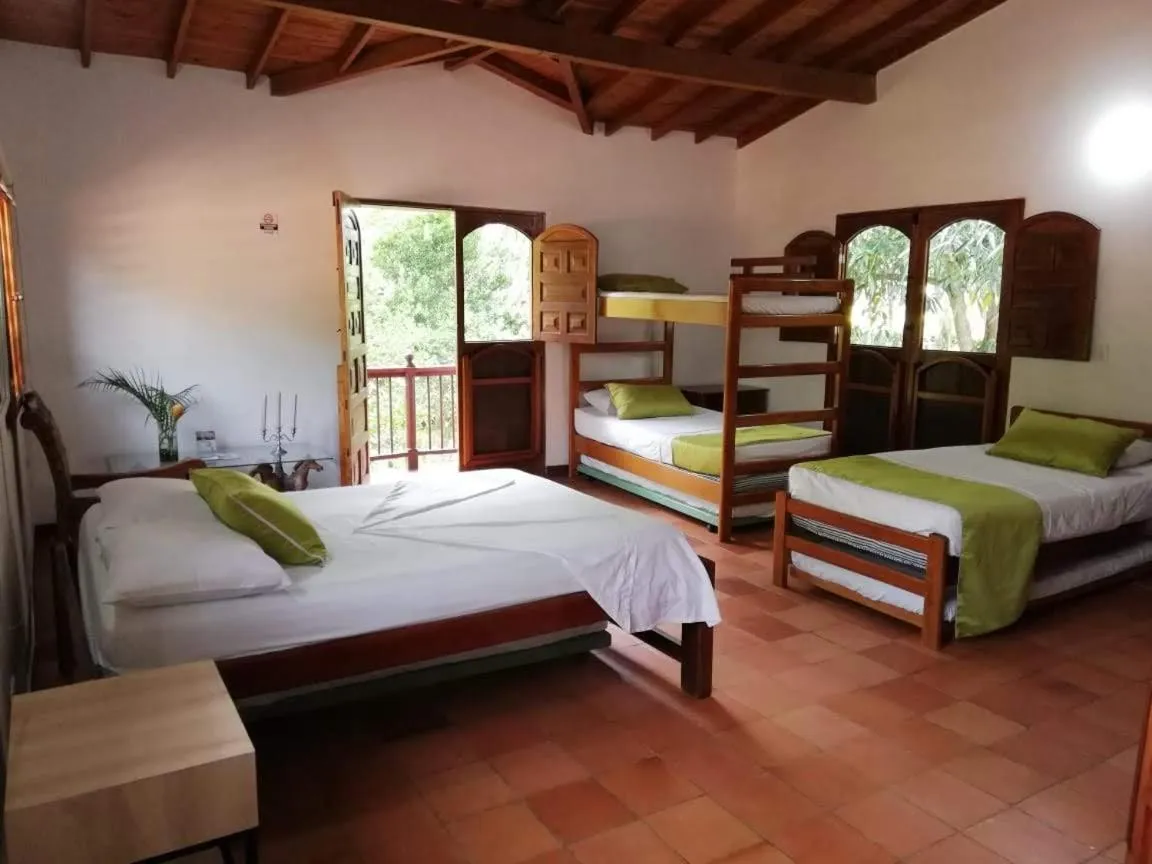 Bed in Finca Hotel La Estancia