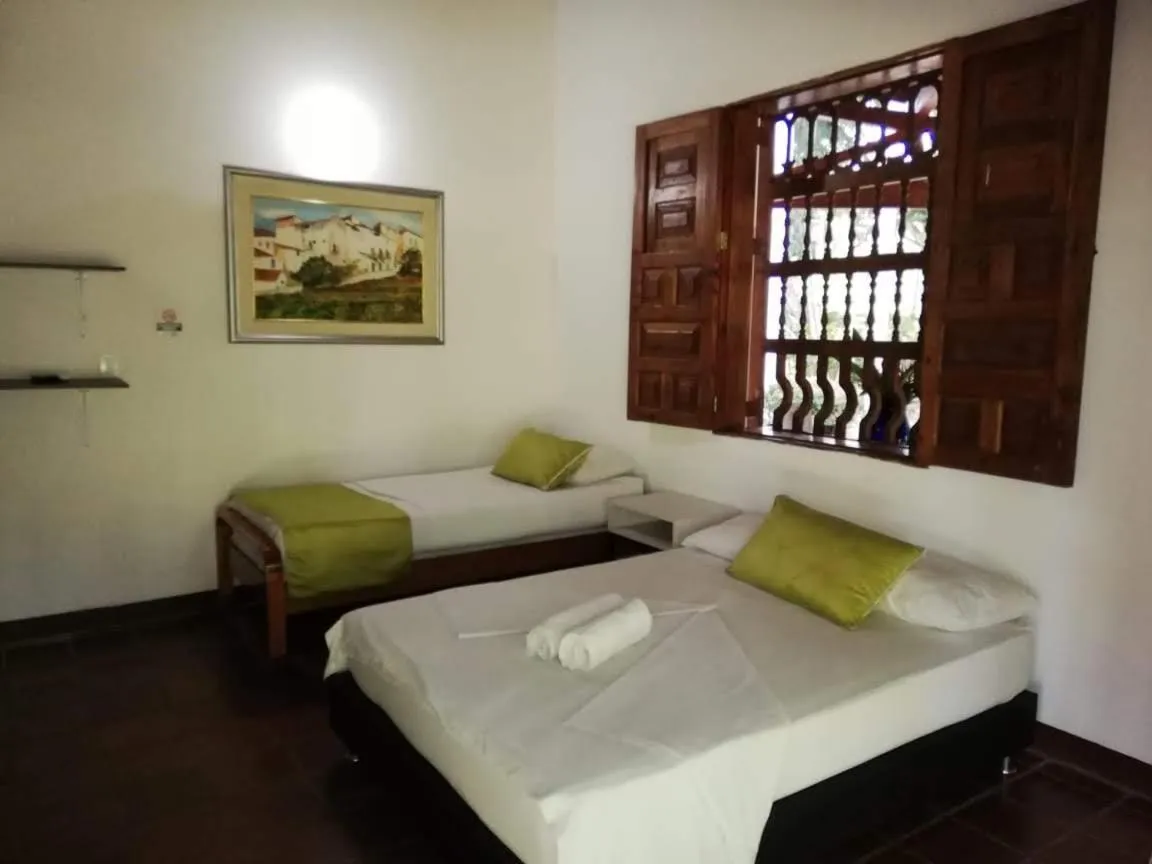 Bed in Finca Hotel La Estancia