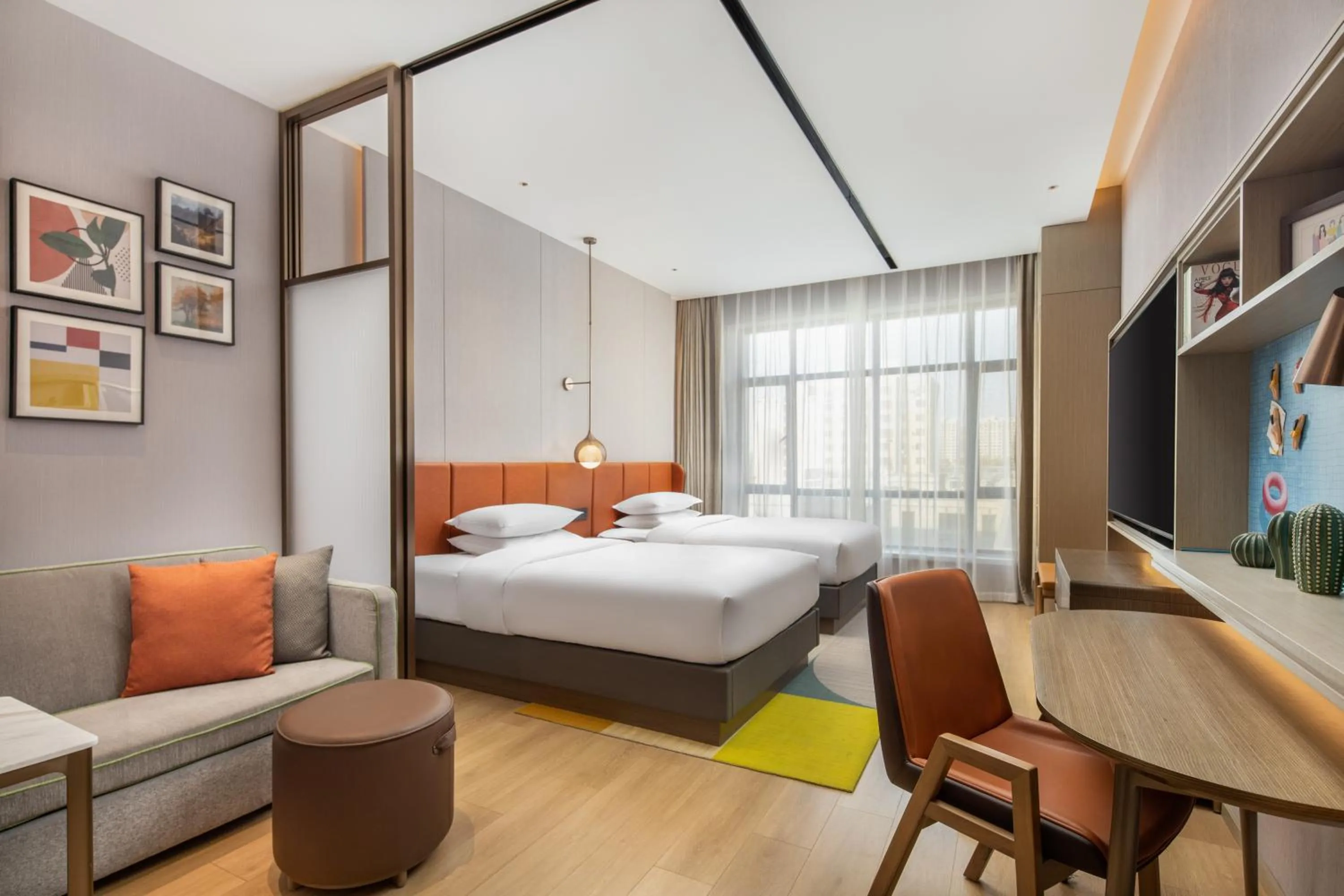 Photo of the whole room in Home2 by Hilton Xinjiang Kuche