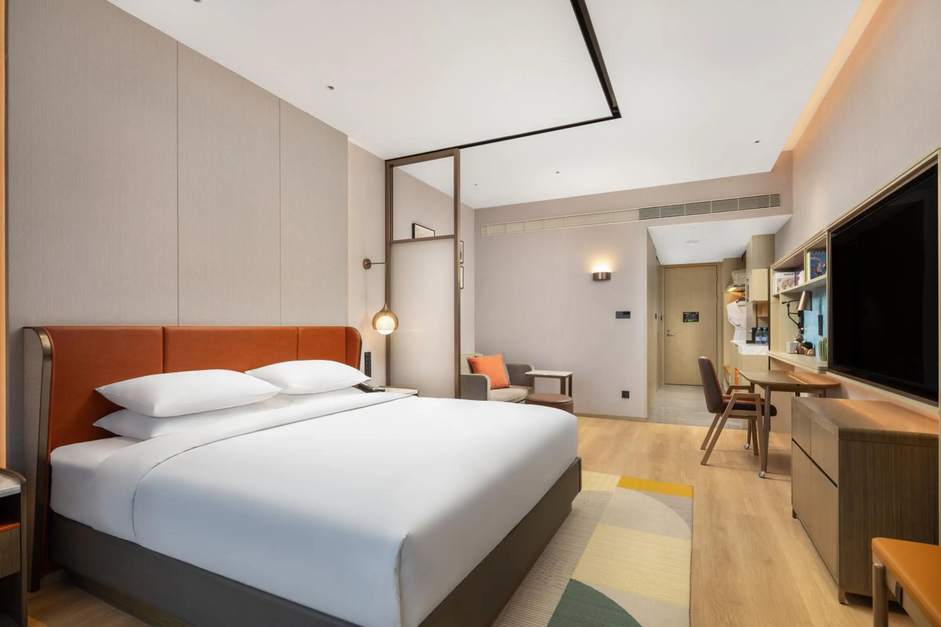 Photo of the whole room in Home2 by Hilton Xinjiang Kuche