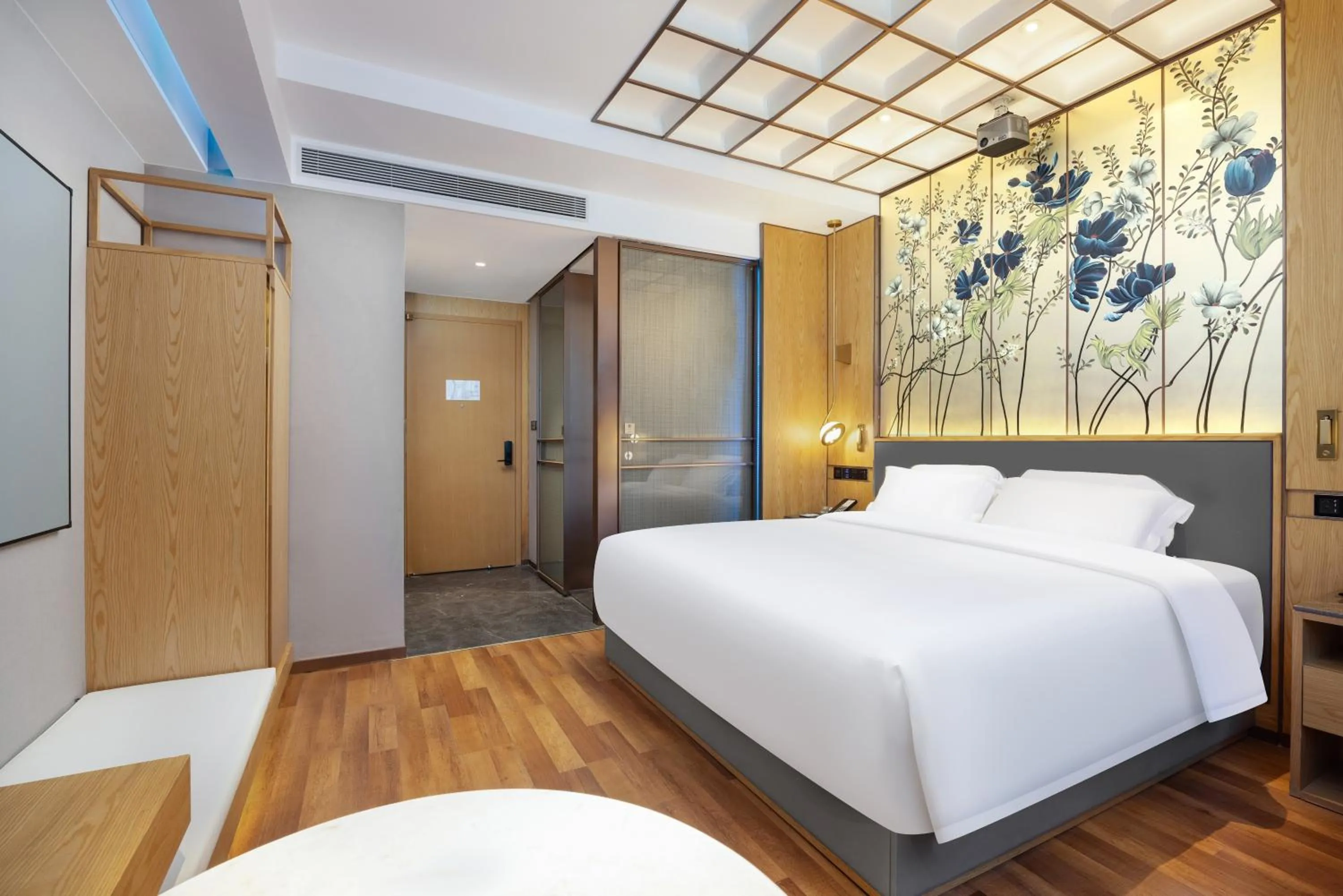 Bed in Jingli Hotel - Beijing New National Exhibition Capital Airport