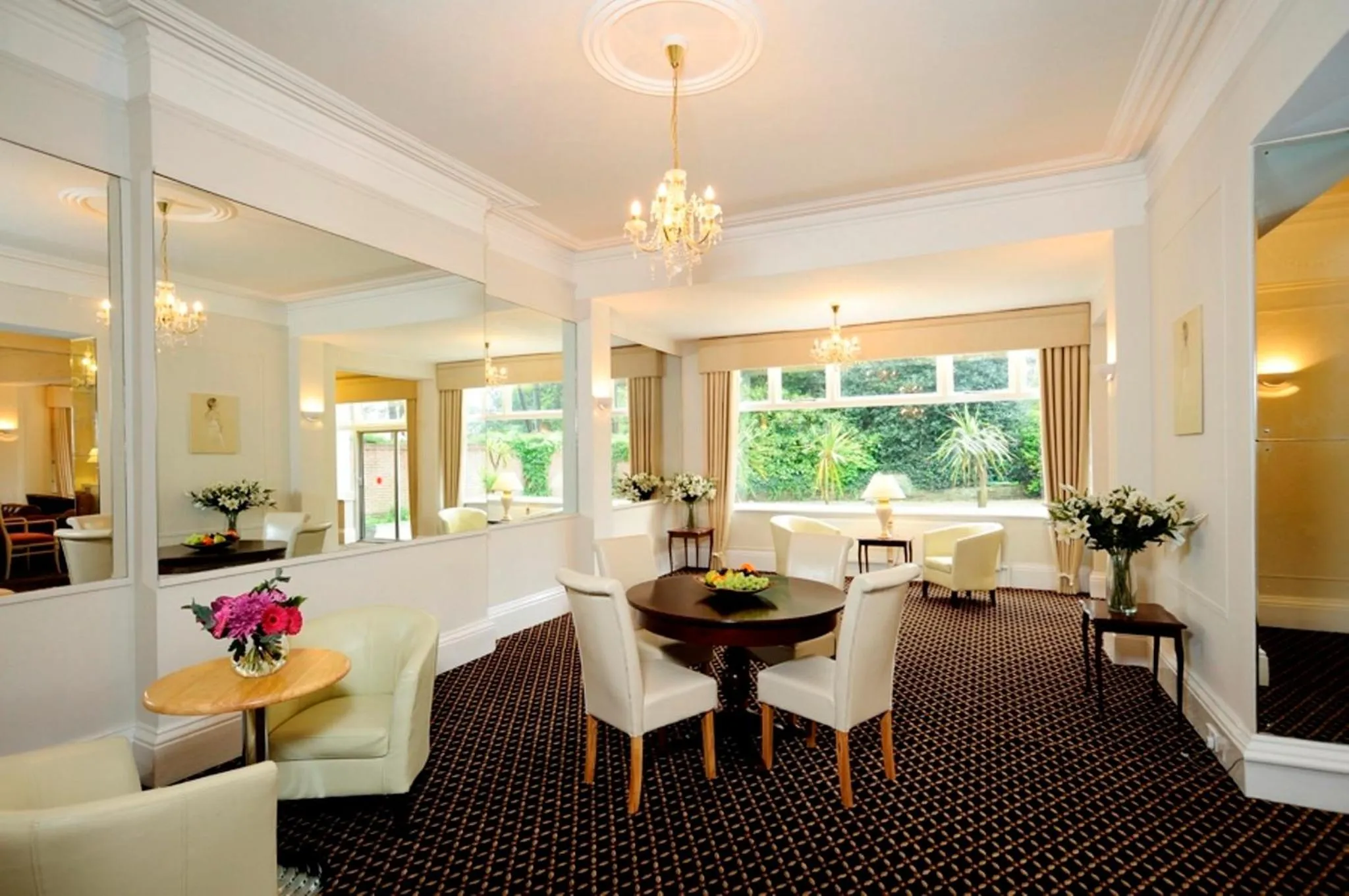 Communal lounge/ TV room in Burley Court Hotel