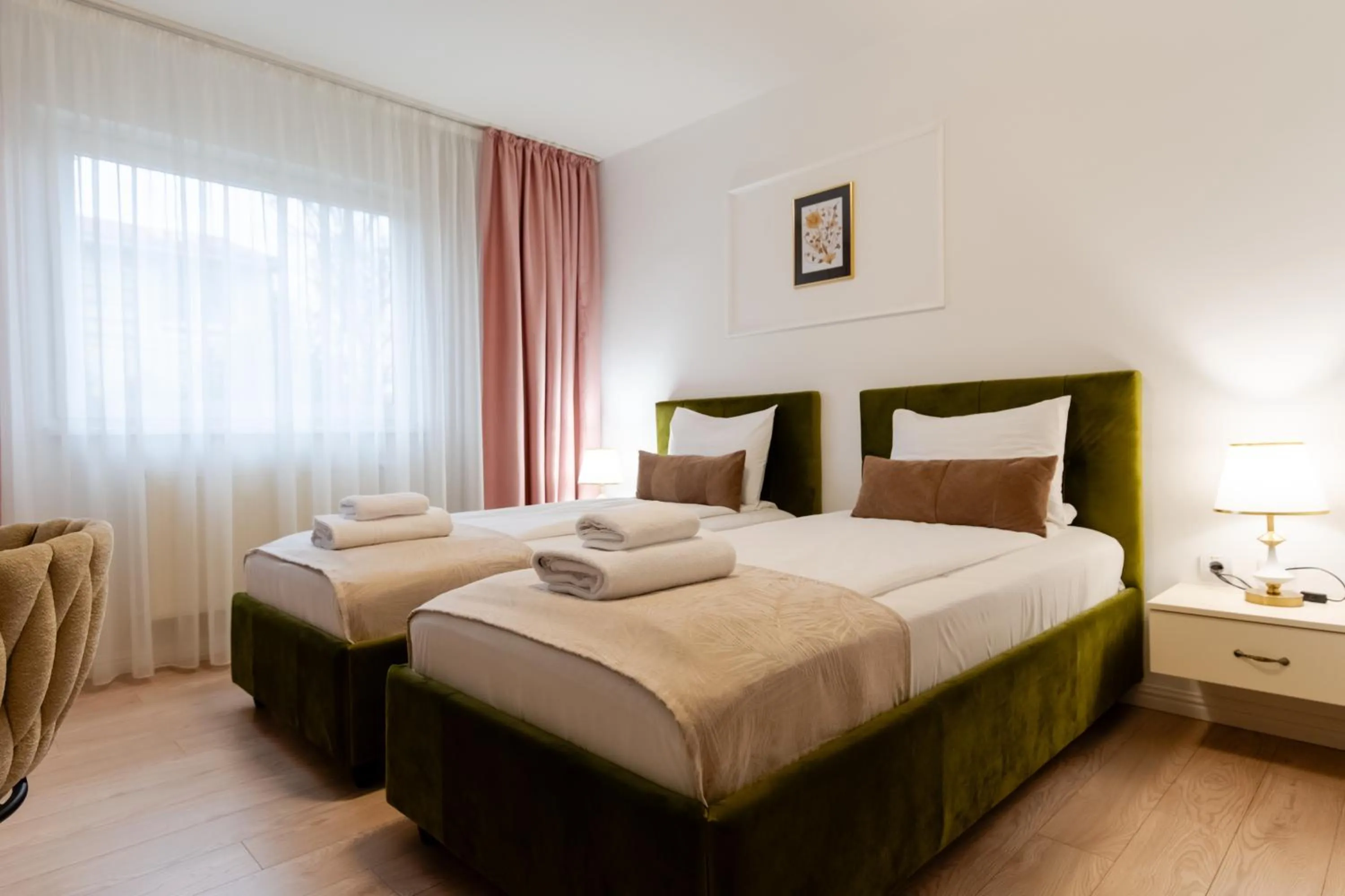 Bed in Hotel Royal Plaza By TimHotels