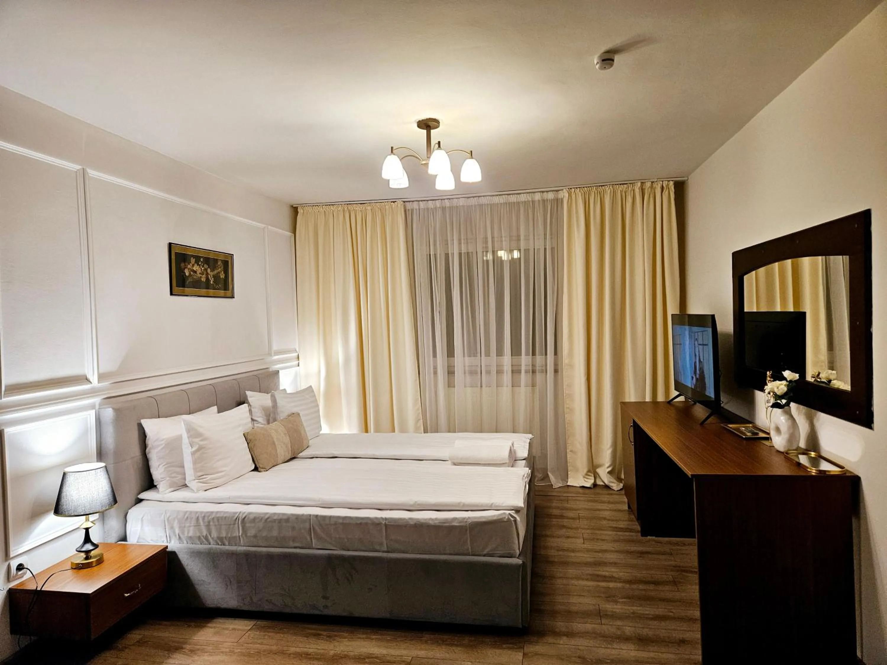 Bed in Hotel Royal Plaza By TimHotels