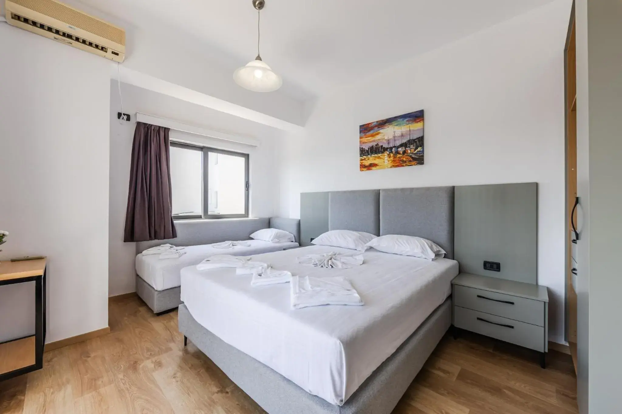 Triple Room with Sofa and Sea View in Hotel Kompleks Joni Triple Room with Sofa and Sea View in Hotel Kompleks Joni