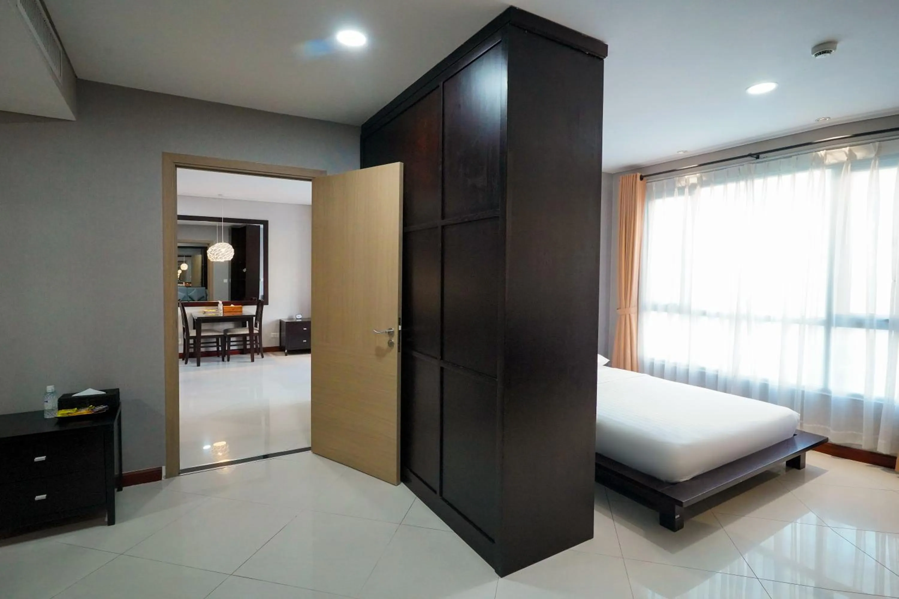Photo of the whole room, Bed in Lancaster Ho Chi Minh Serviced Apartment Official