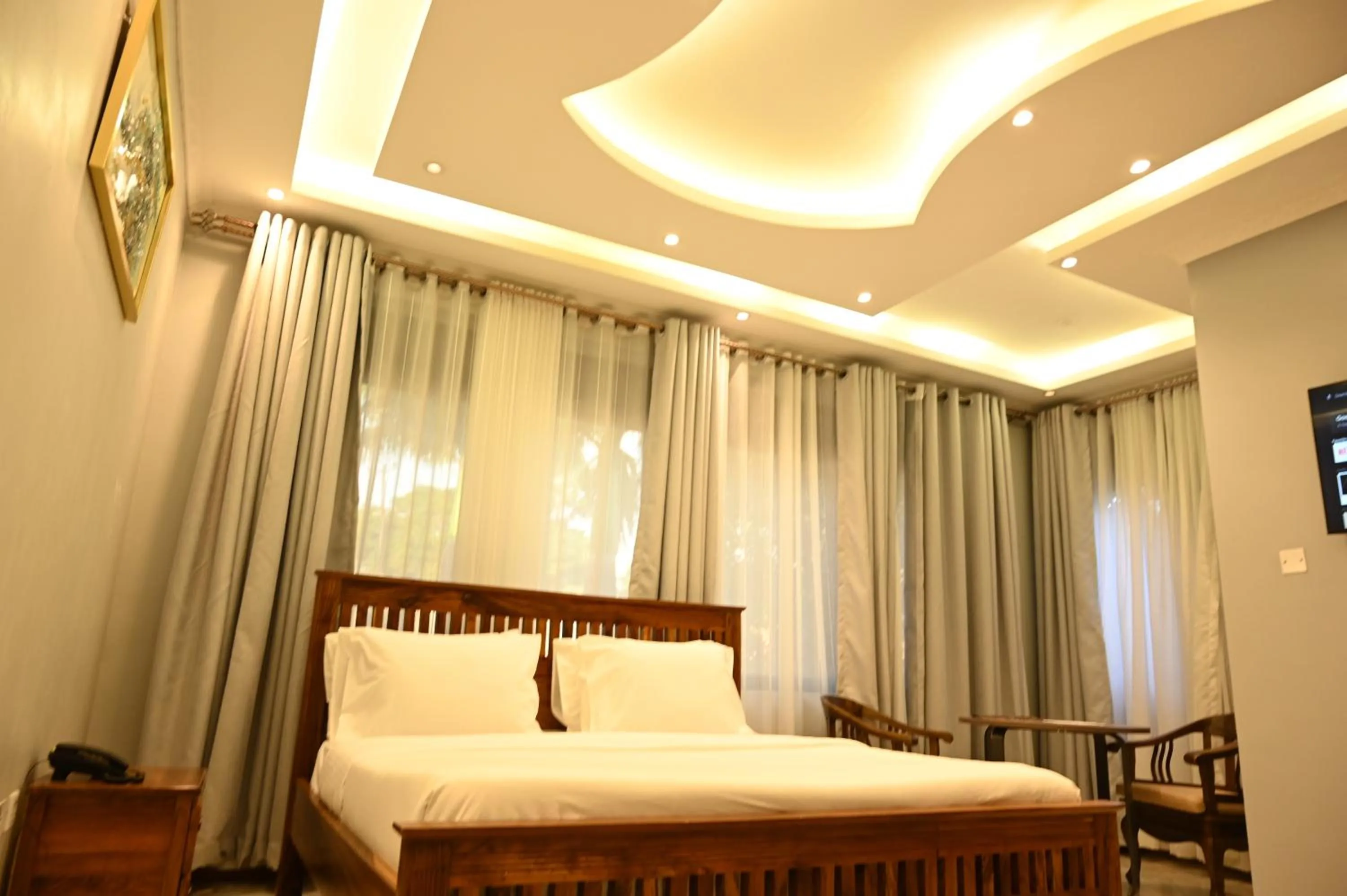 Bed in Neon Hotel Ntinda