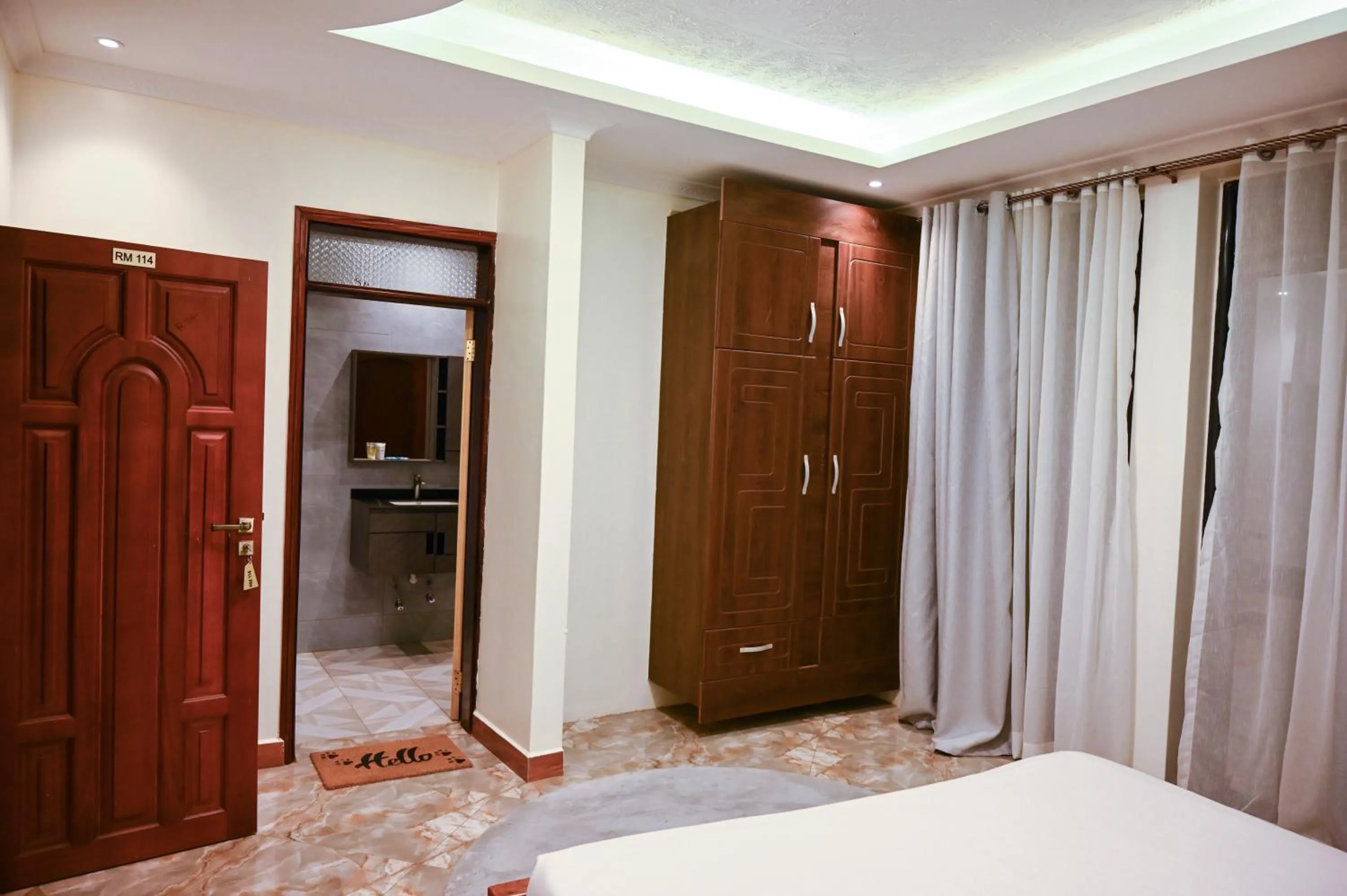 Bed in Neon Hotel Ntinda