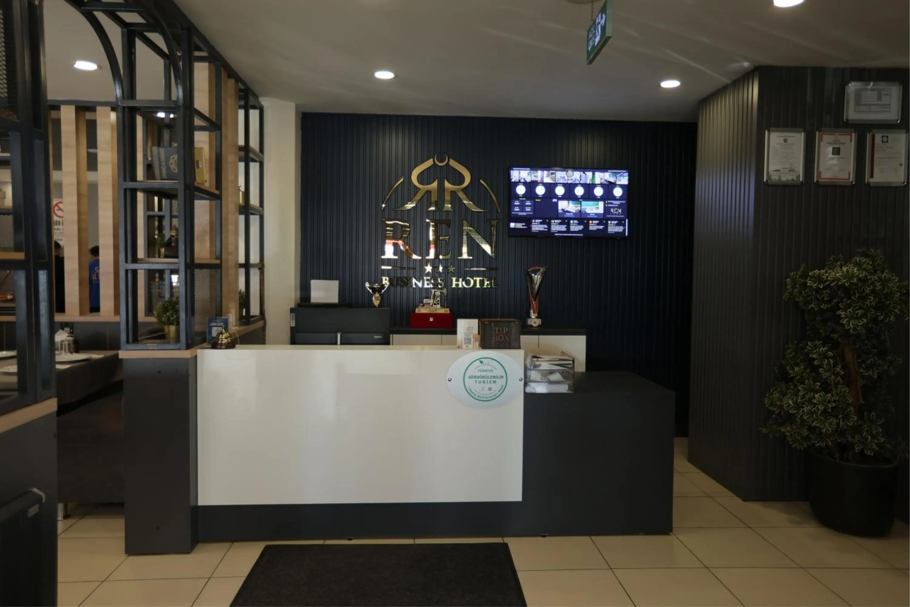 Property logo or sign in Ren Business Hotel