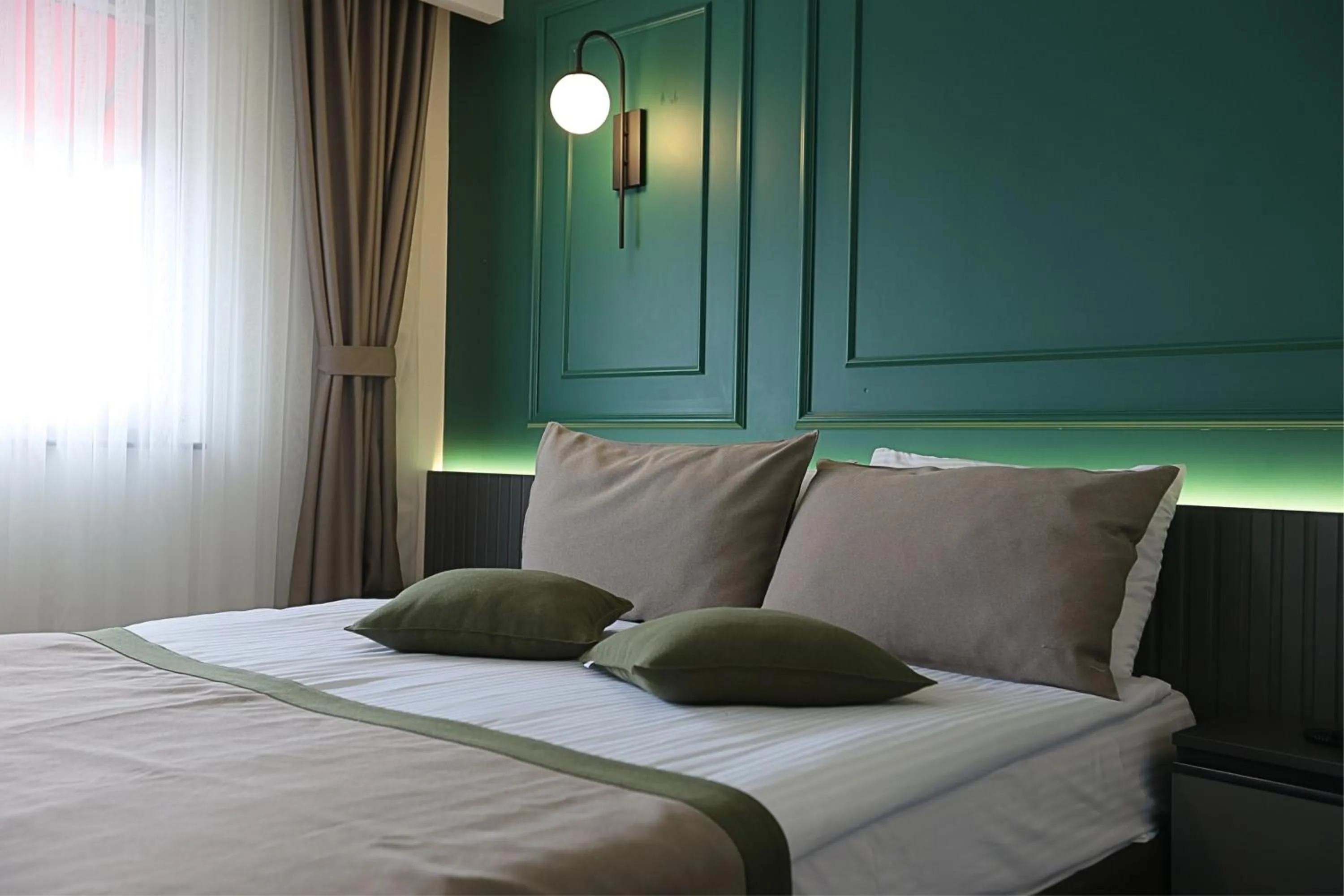 Bed in Ren Business Hotel