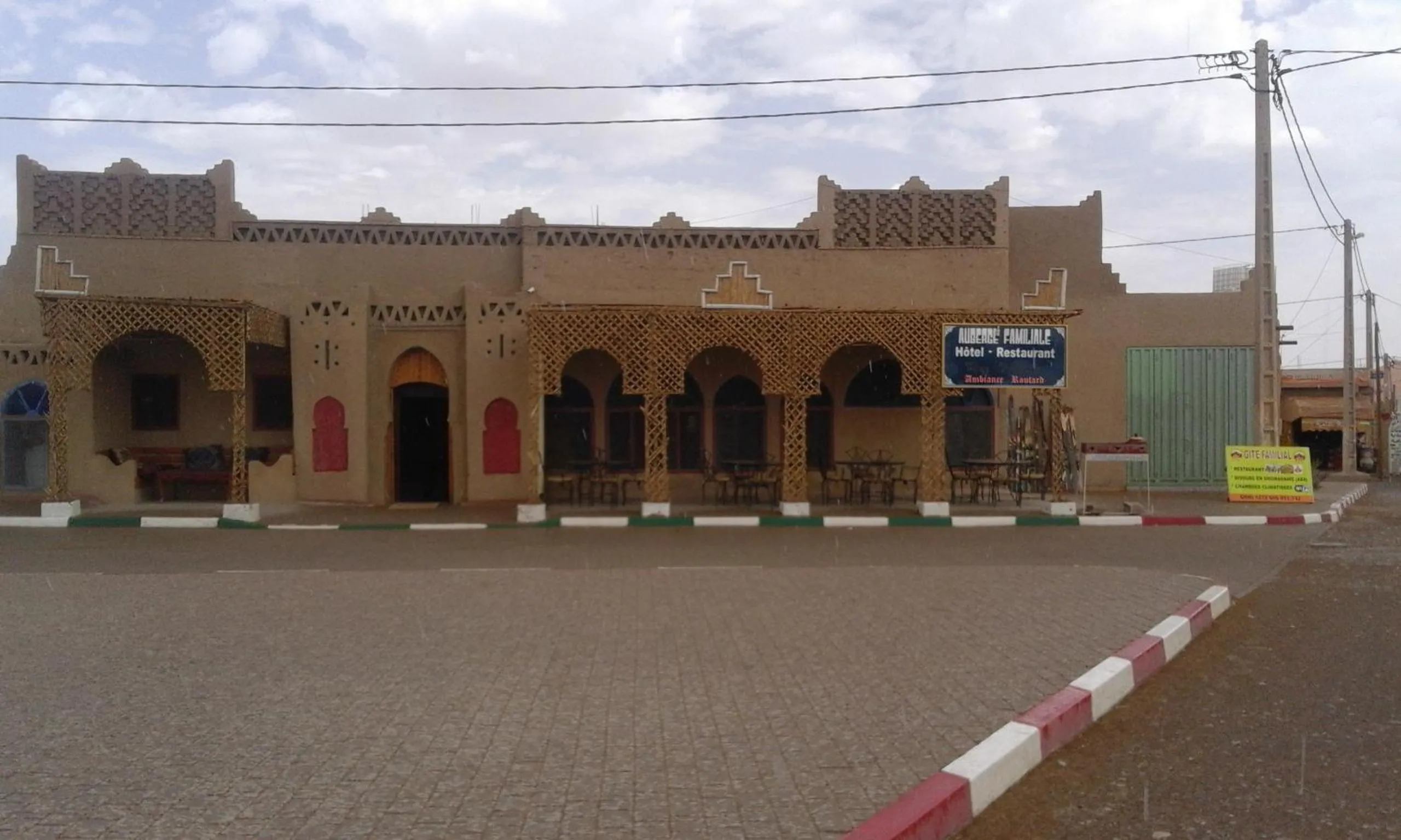 Property logo or sign in Chez Belkacem