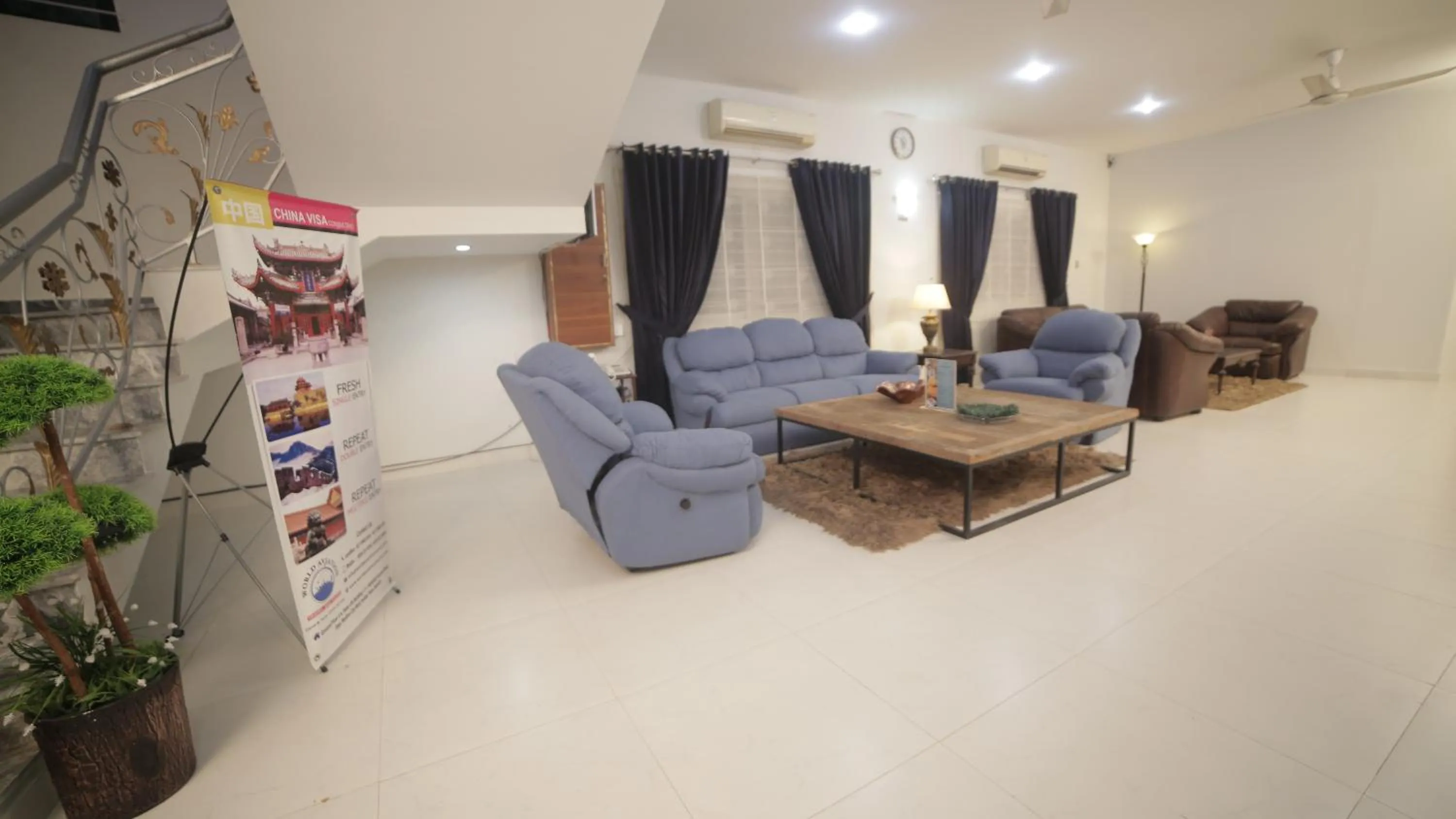 Living room in Four Squares by WI Hotel