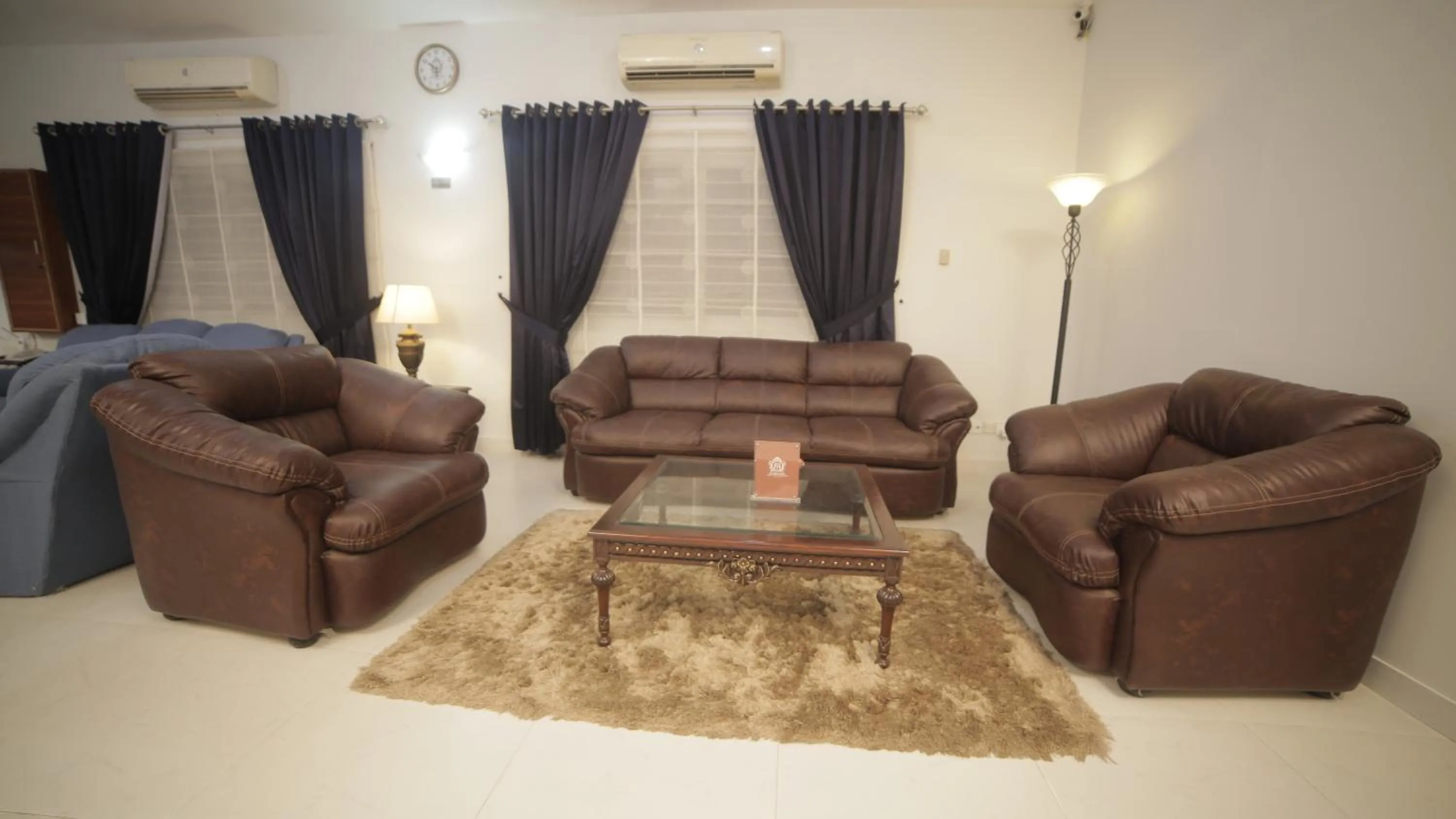 Living room in Four Squares by WI Hotel