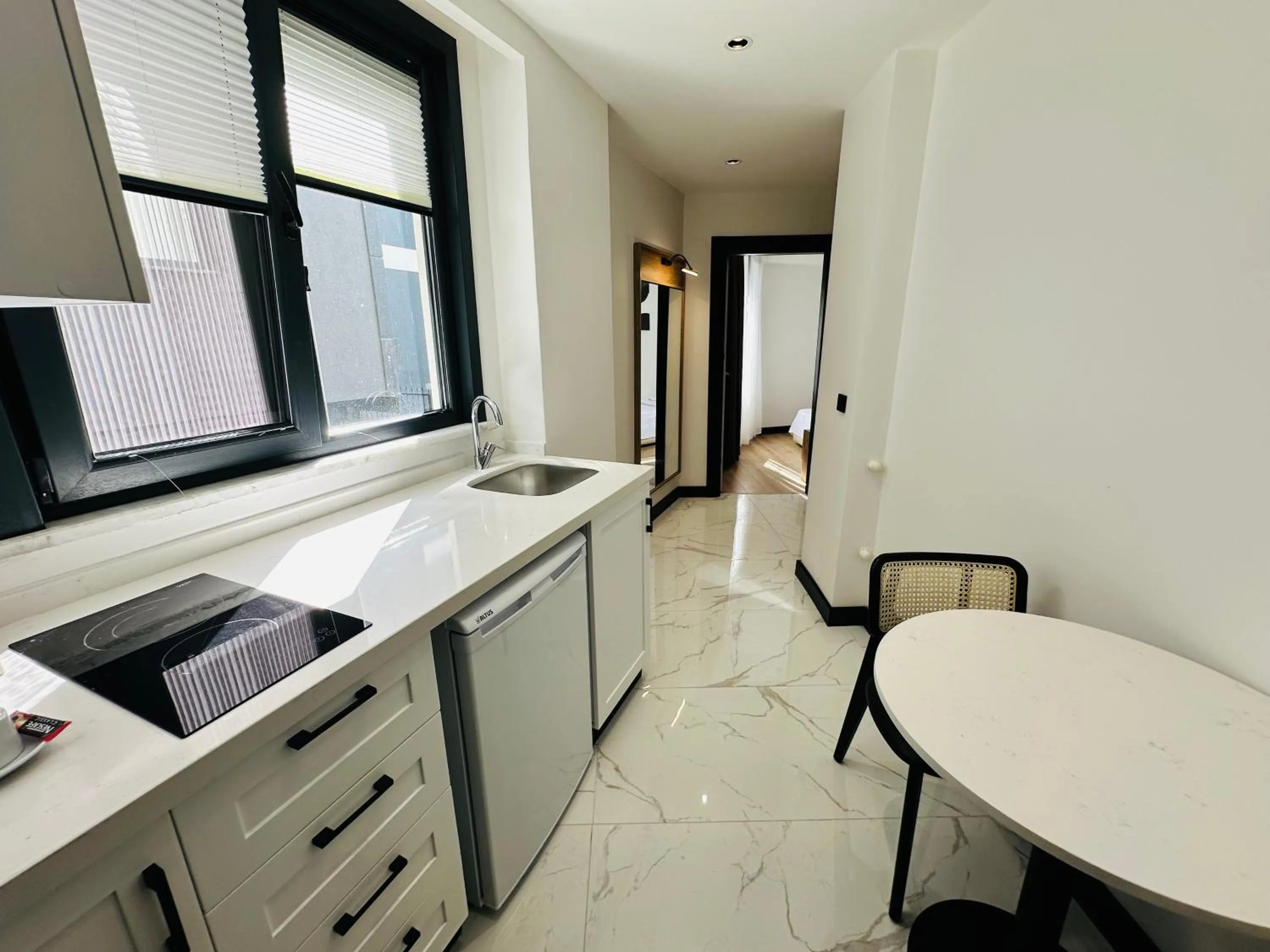 Kitchen or kitchenette in Rose Point Residence
