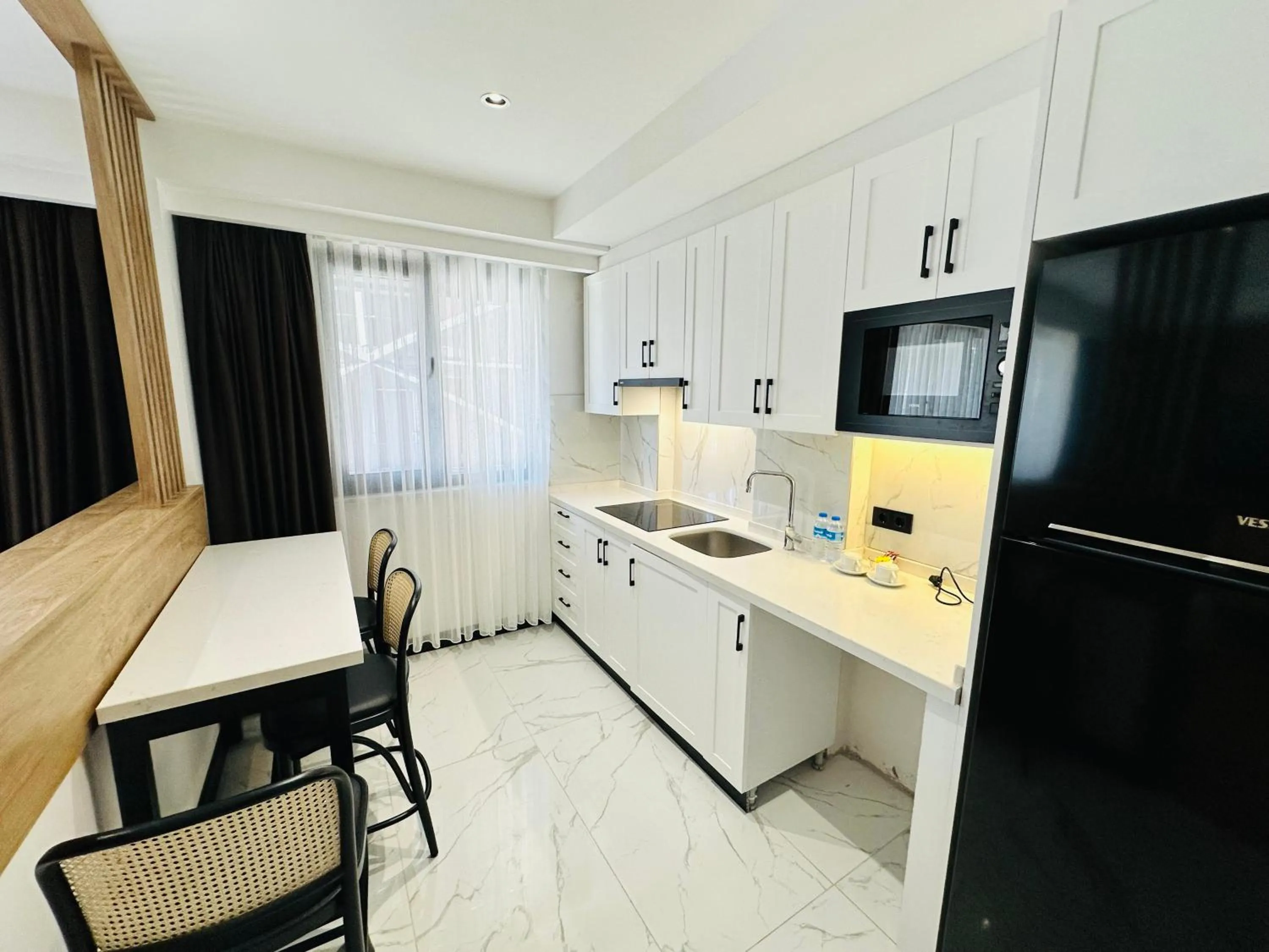 Dining area in Rose Point Residence
