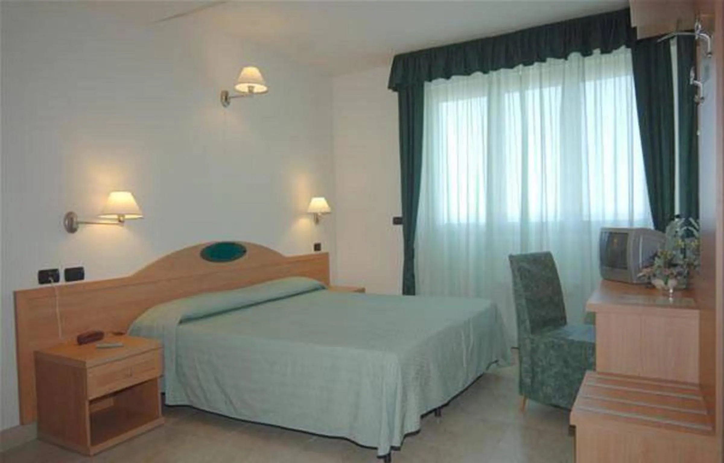 Bed in Hotel Ristorante Paradiso