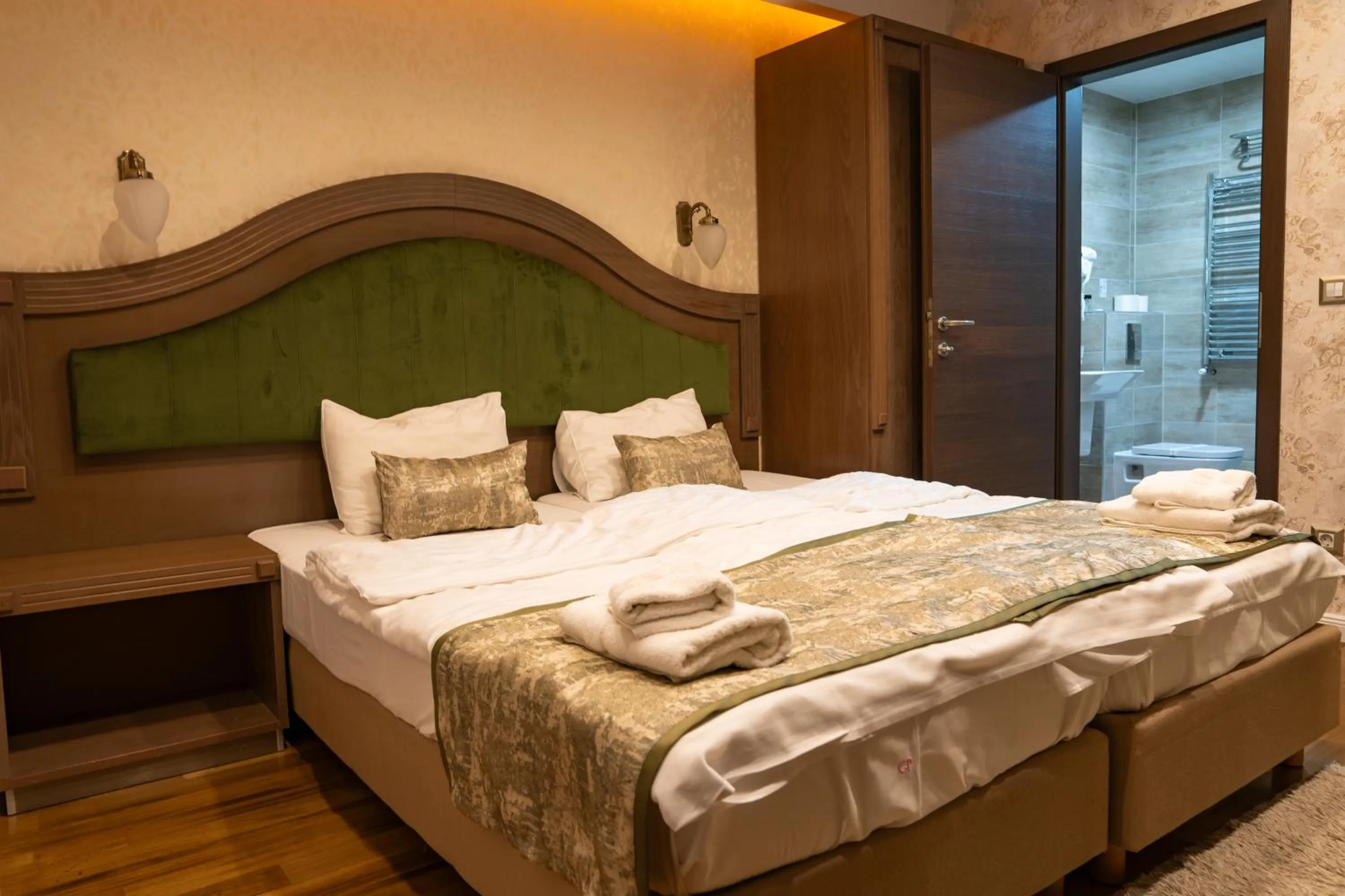 Bed in City Palace Hotel