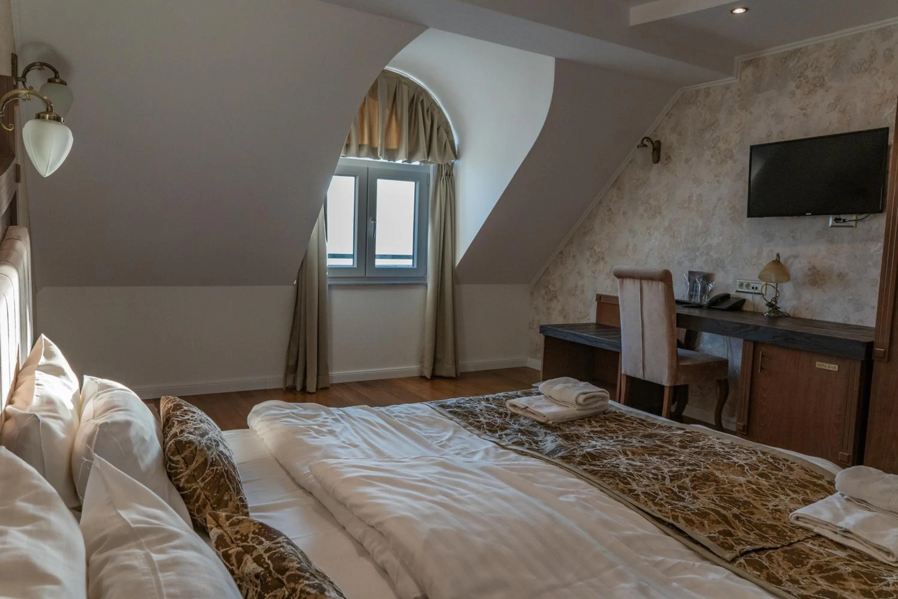 Bed in City Palace Hotel