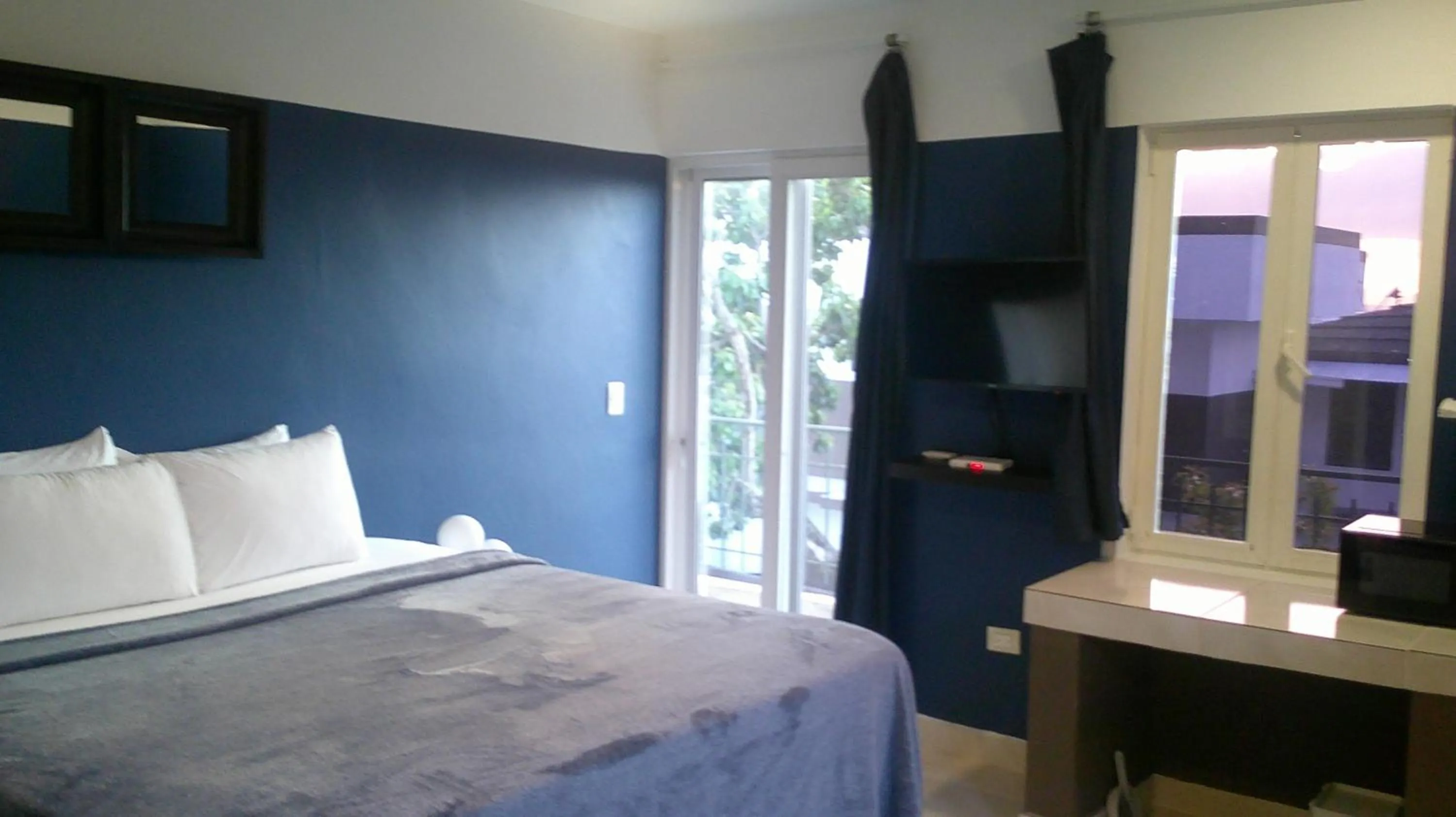 Bed in E&J Boutique Residences