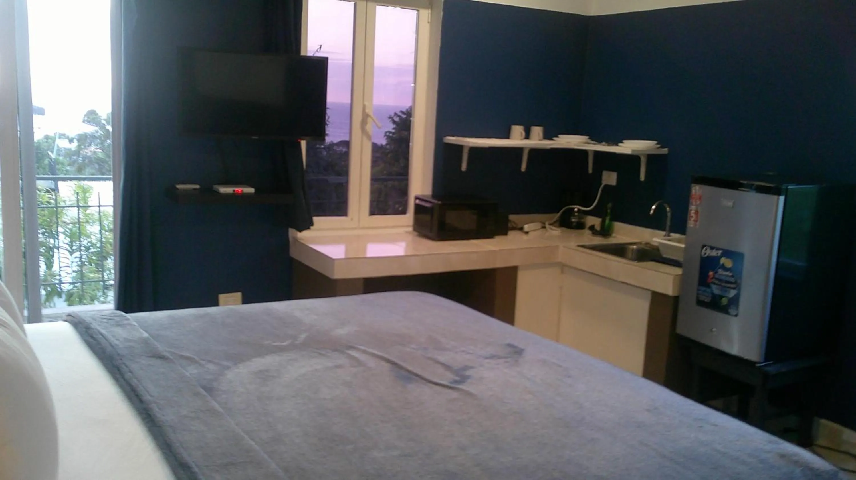 Bed in E&J Boutique Residences